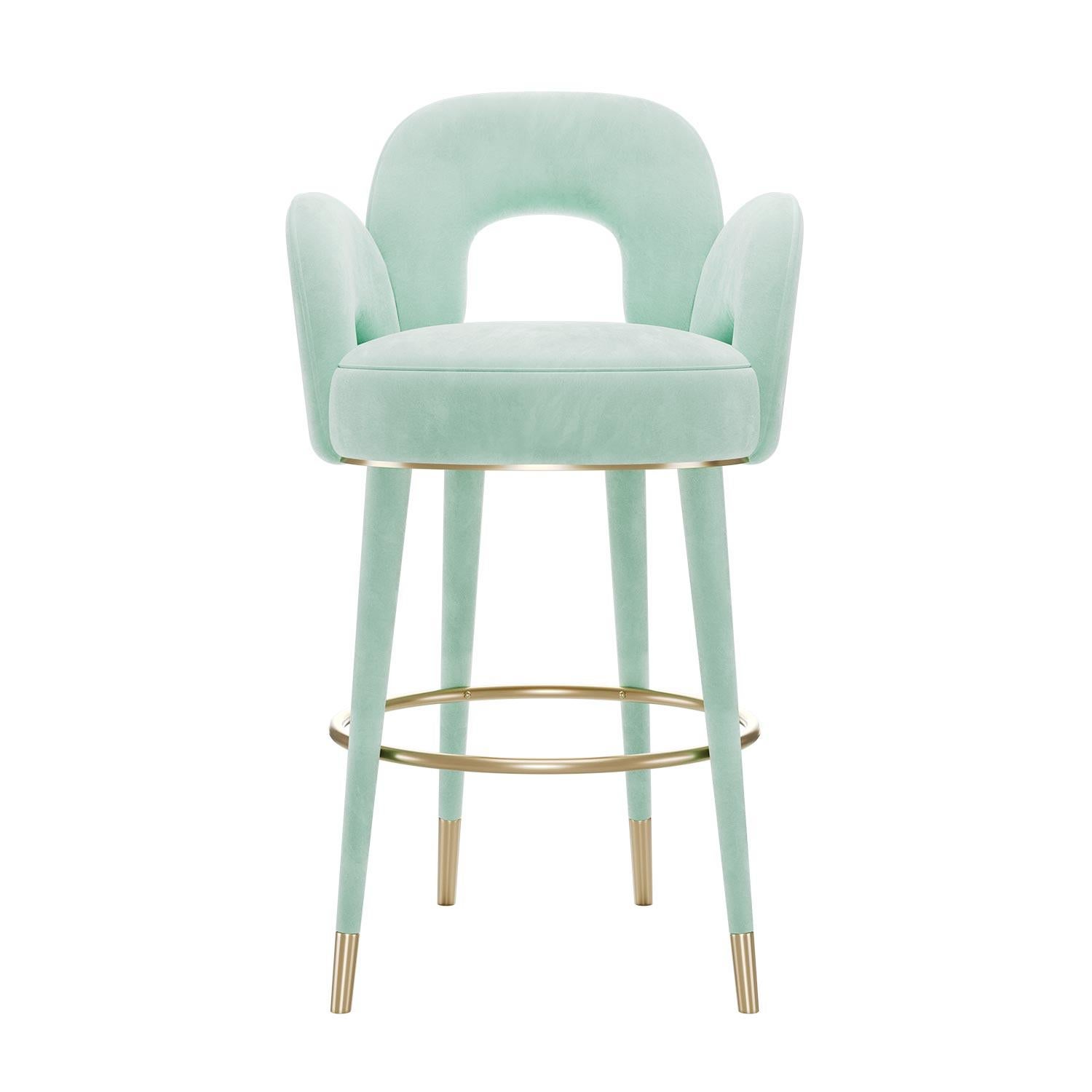 With its gracefully curved silhouette and thoughtful design, the Amuse Bar Stool is rooted in the spirit of mid-century elegance. Its sculptural backrest and armrests recall an era where design was not only functional, but emotive, playful, and