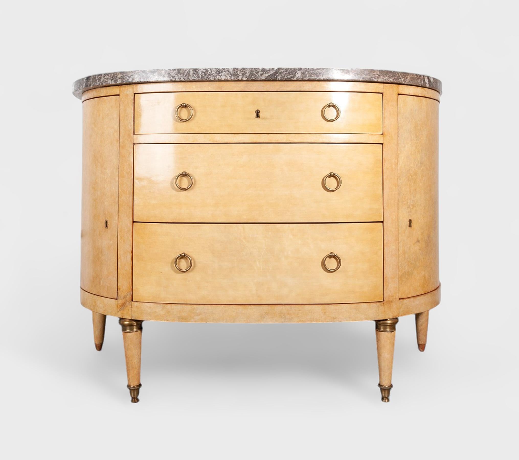 Mid-20th century Modern André Arbus-style parchment-covered wood and marble demilune dresser, France

By: André Arbus (in the style of)
Material: wood, parchment paper, metal, marble, stone
Technique: cast, molded, carved, polished
Dimensions: 20.5