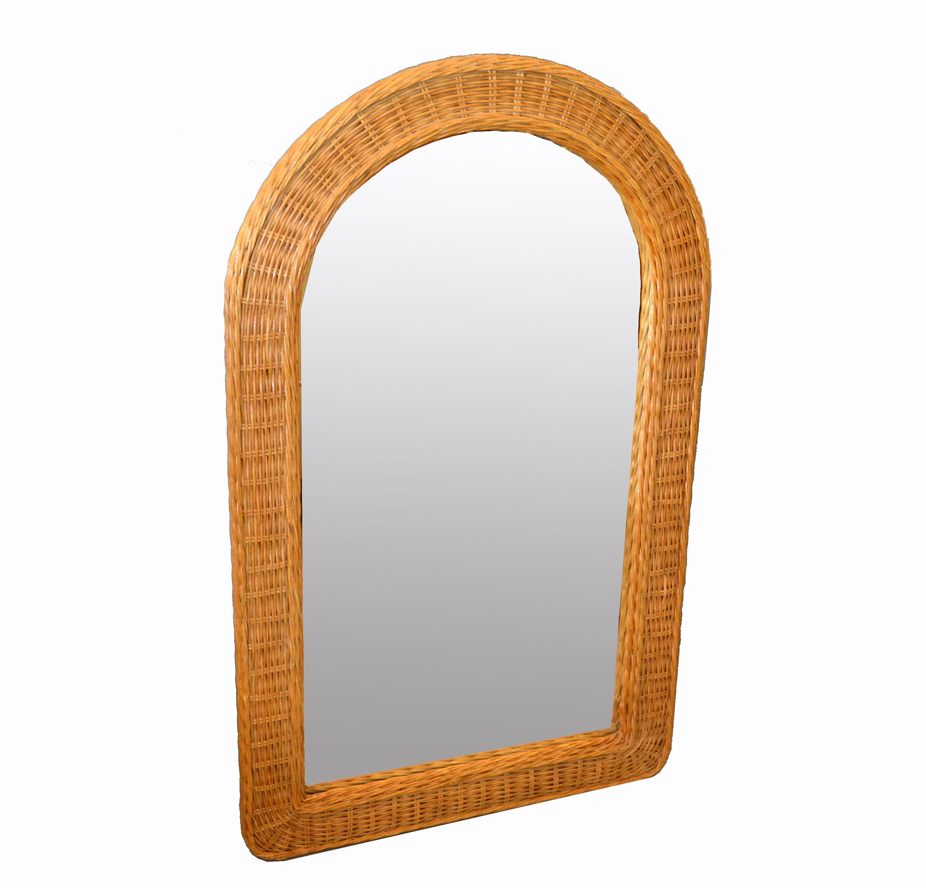 Mid-Century Modern boho chic arch shaped handwoven rattan, wicker wall mirror.
Exemplary construction, woven ties are firmly linked.
Florida Design for Your Sunroom.