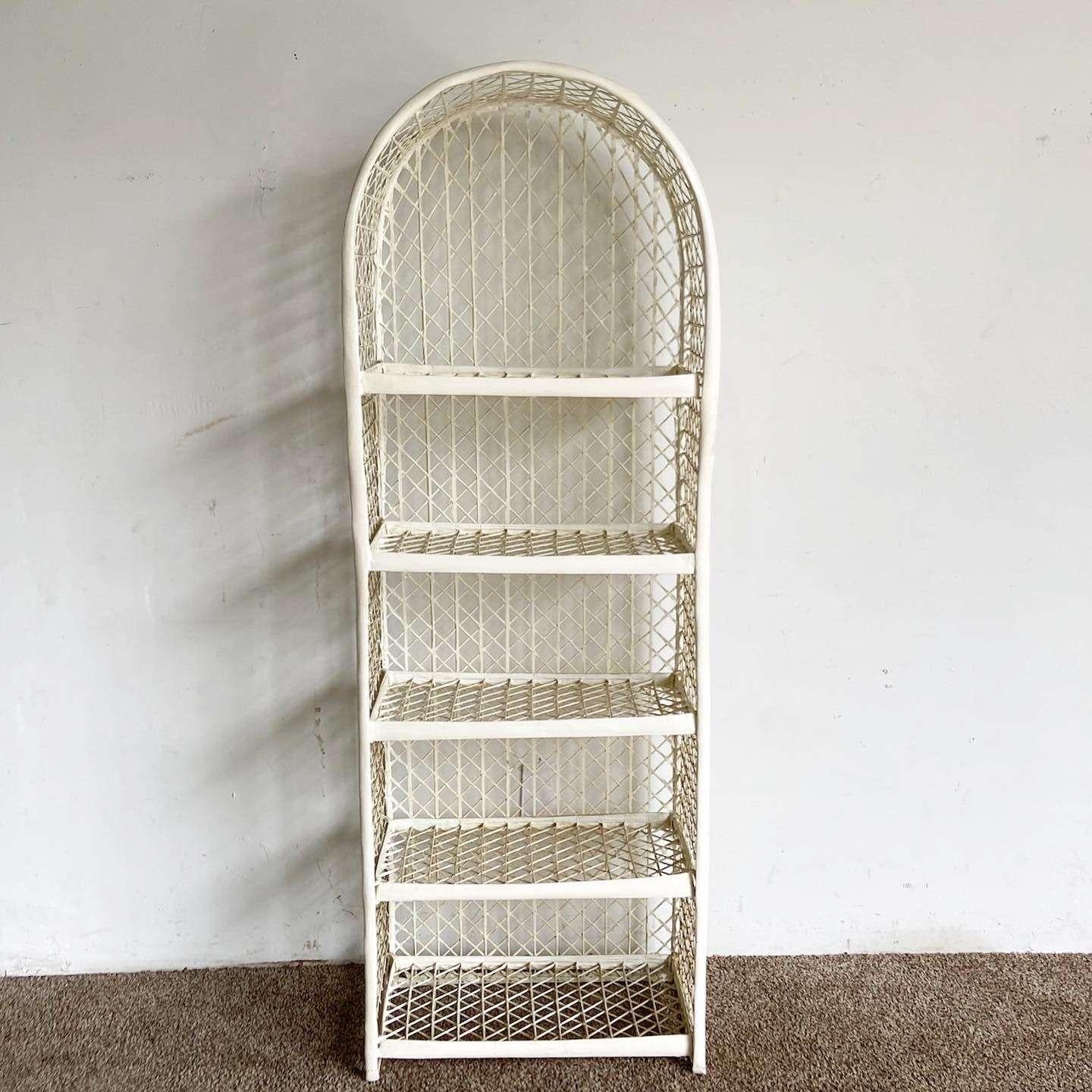 Elevate your space with this wonderful vintage mid century modern Etagere by Russell Woodard. The spun fiberglass construction in an off-white finish and 5 spacious shelves make it a stylish and functional bookshelf.

Vintage mid century modern