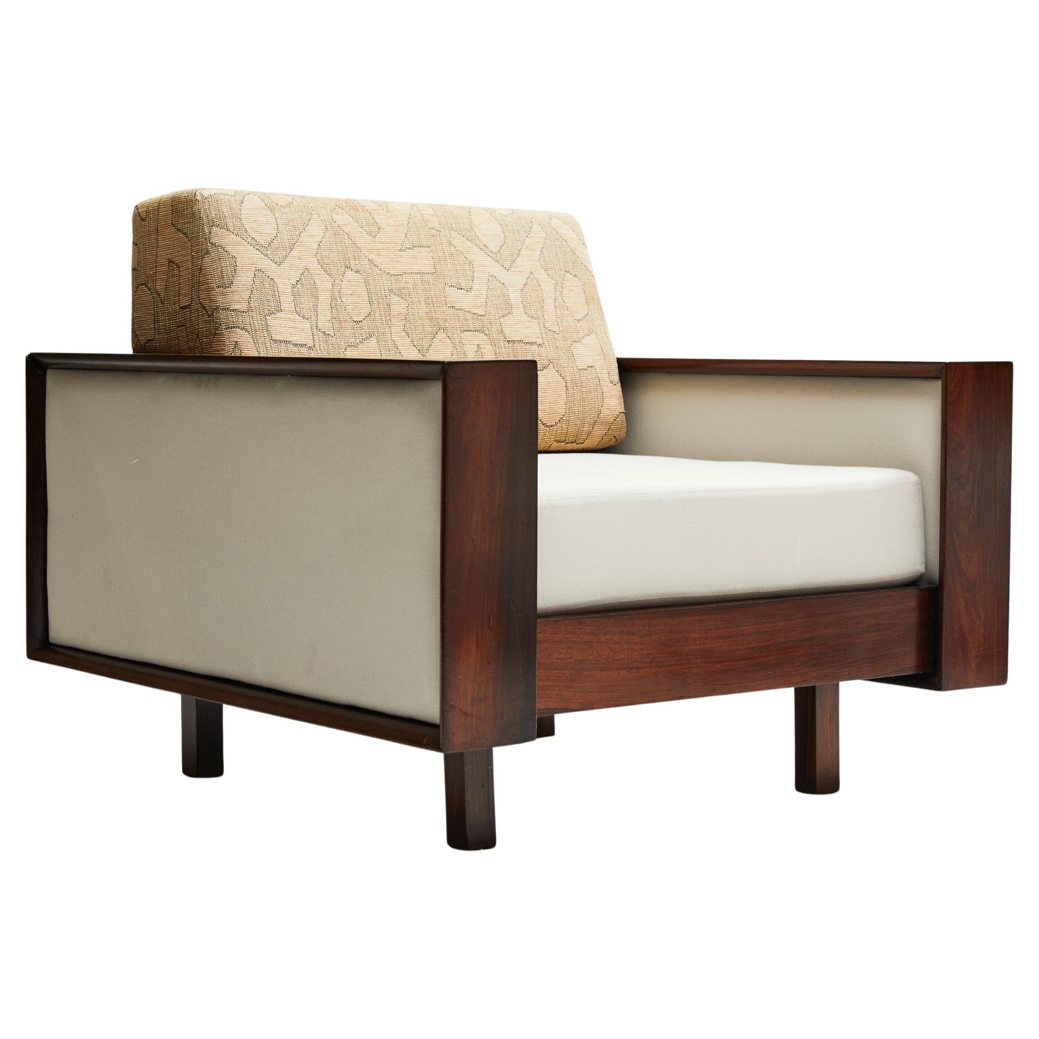 Available today, this Brazilian Modern Armchair in Hardwood & Beige Linen by Celina Decoracoes, is simply exquisite!

This mid-century gem is made in Brazilian Rosewood (as known as Jacaranda) and has loose re-upholstered cushions. The top cushion