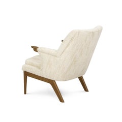 Mid-Century Modern Armchair with Wooden Accents and Button-Tufted Upholstrey