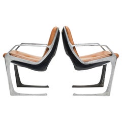 Mid-Century Modern Armchairs in Aluminum & Brown Leather. Jorge Zalszupin Brazil