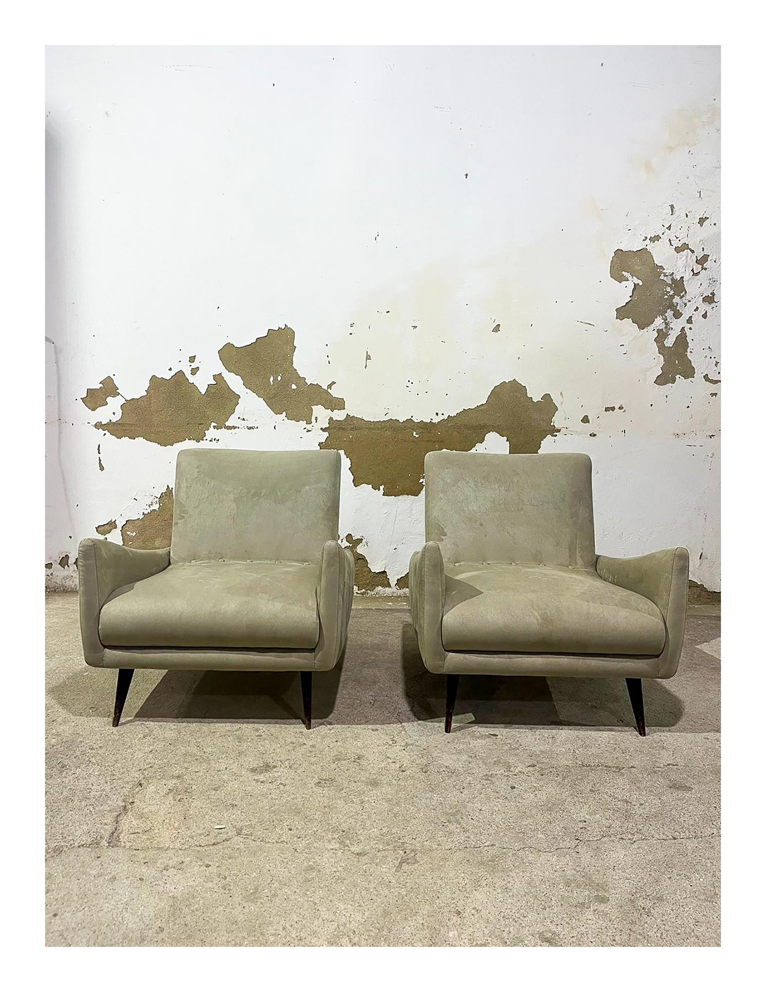 Available now, this Mid Century Modern Armchairs in Hardwood & Fabric attributed to Jorge Zalszupin are nothing less than spectacular. 

This pair was designed in the sixties and feature a wooden structure with hardwood feet, and it has received a