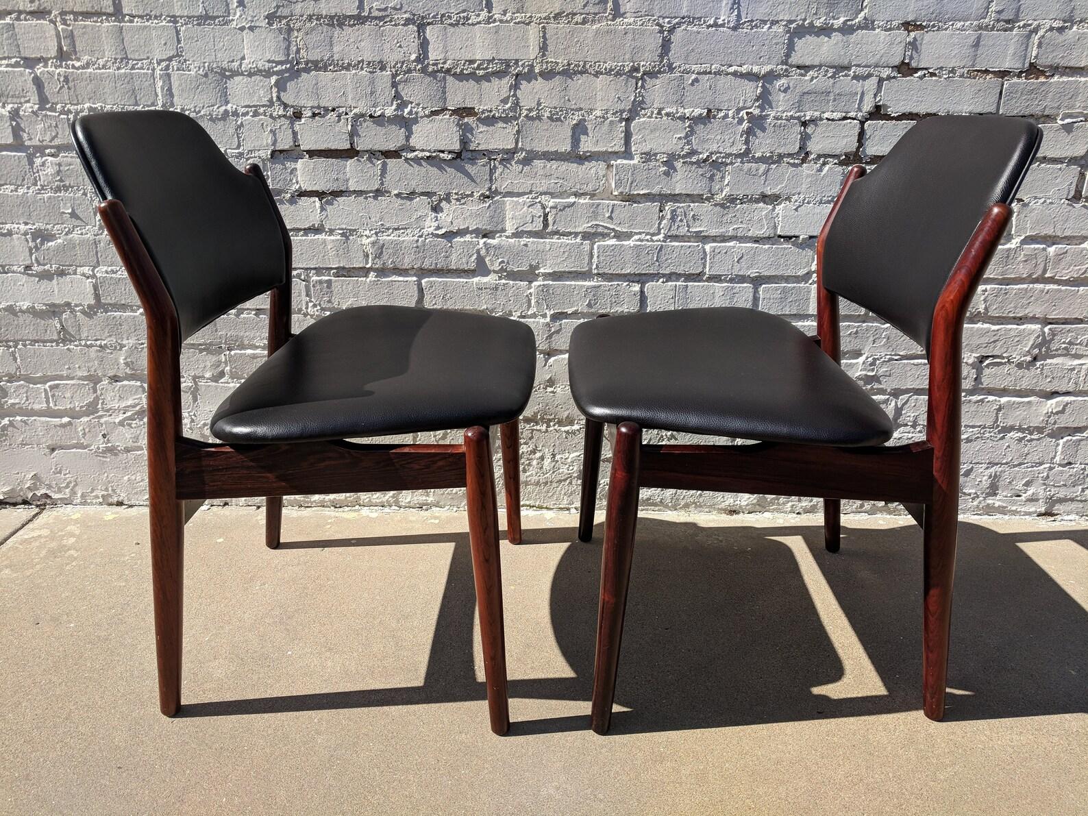 Mid Century Modern Arne Vodder Dining Table and Chairs

Above average condition and structurally sound. Table and inserts have some light finish wear and a couple scratches which should be visible in the listing pictures. Chairs are newly recovered.
