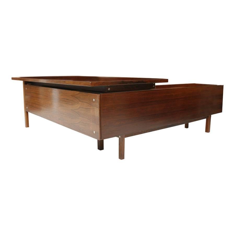 Desk with dresser designed by Arne Vodder (1926-2009) made in rosewood. Desk table with drawers and sideboard composed of drawers and shutter doors. 

Arne Vodder is best known for his furniture designs, which tended to be simple pieces composed