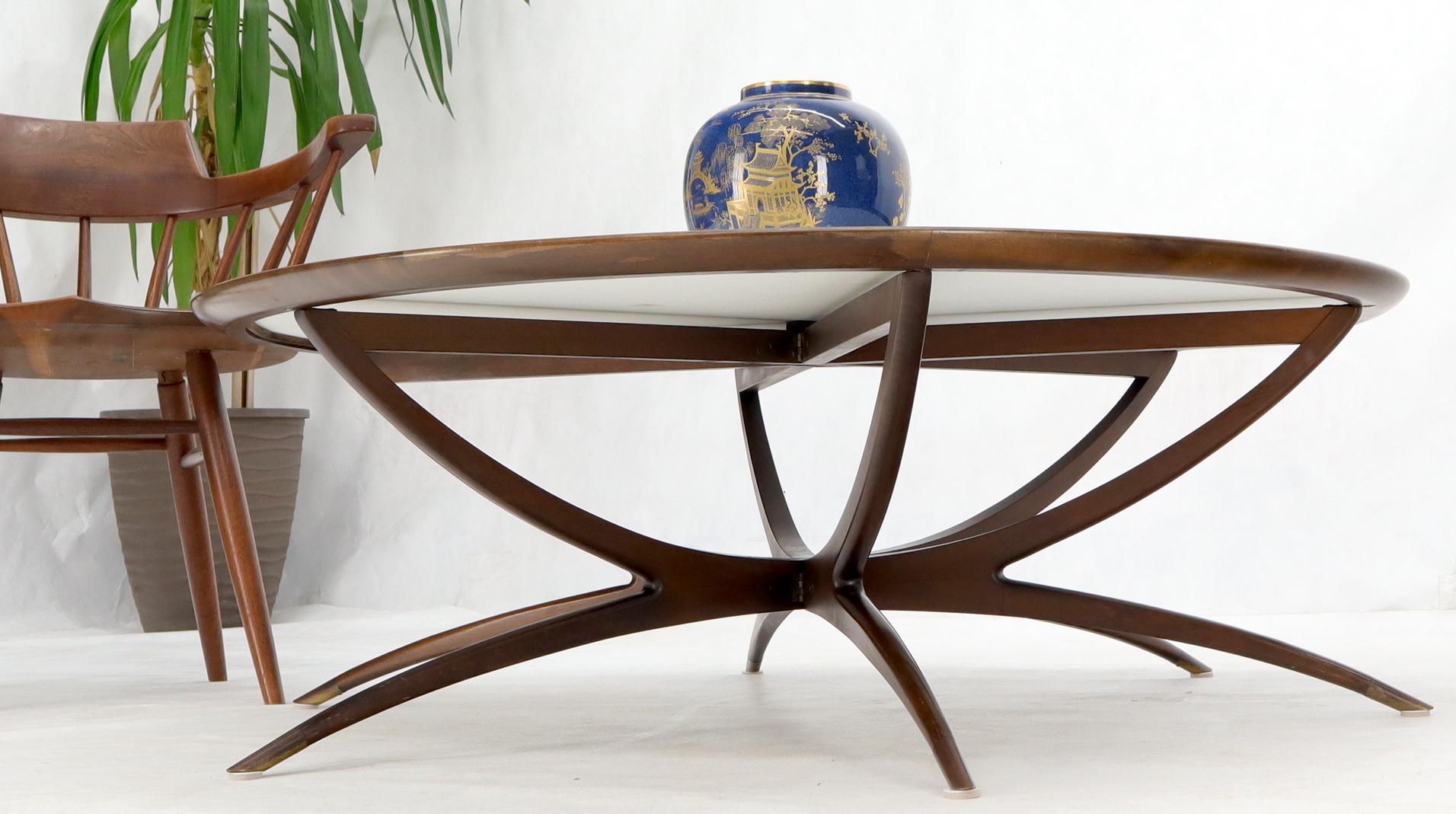 Stunning Mid-Century Modern white Vitrolite glass top walnut base spider round coffee table.