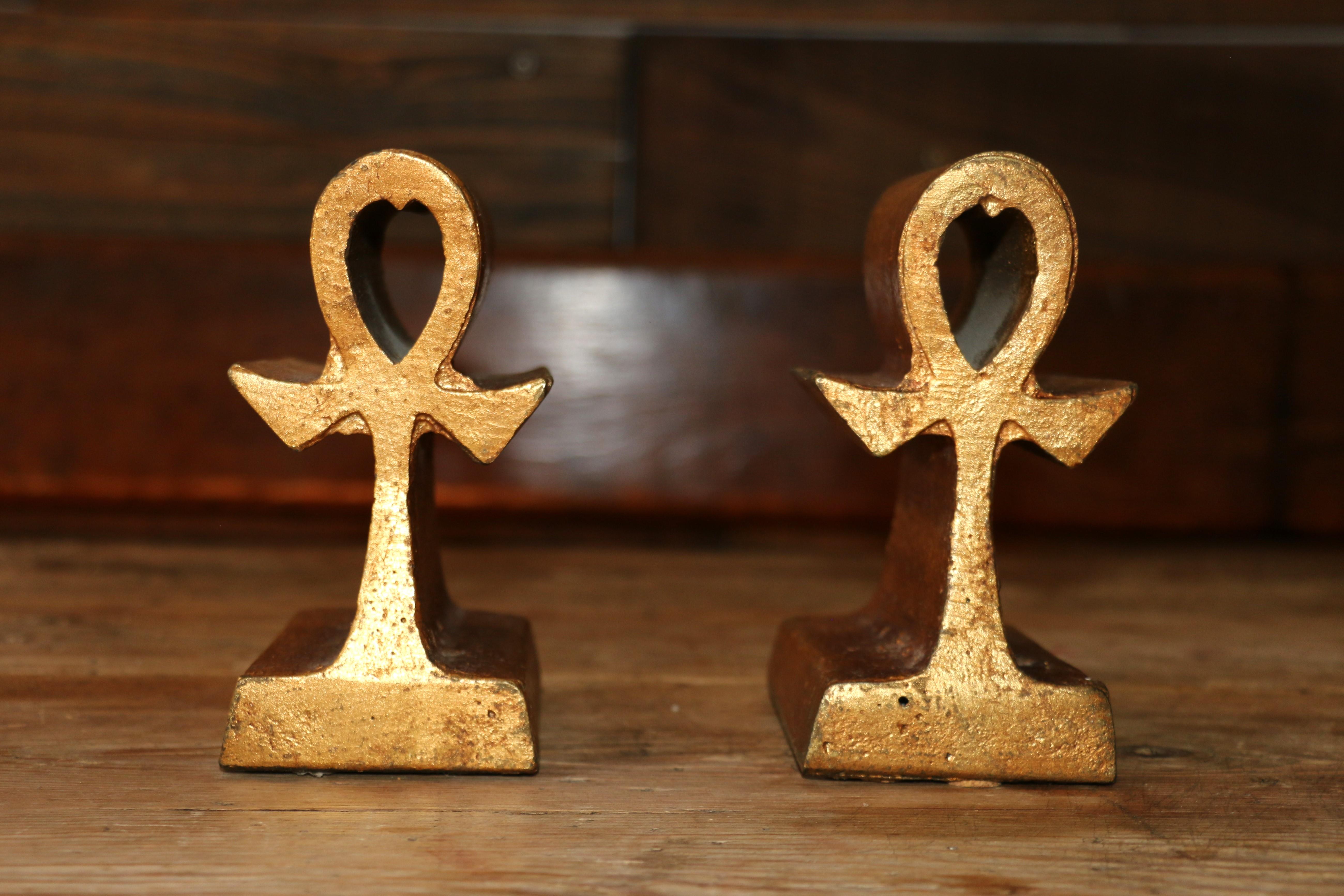 Beautiful pair of mid-century bookends designed by Curtis Jere, (both of them are signed). They are very solid. Considered good vintage condition with natural age and minimal wear on the patina and bottom. Absolutely nice design and good quality