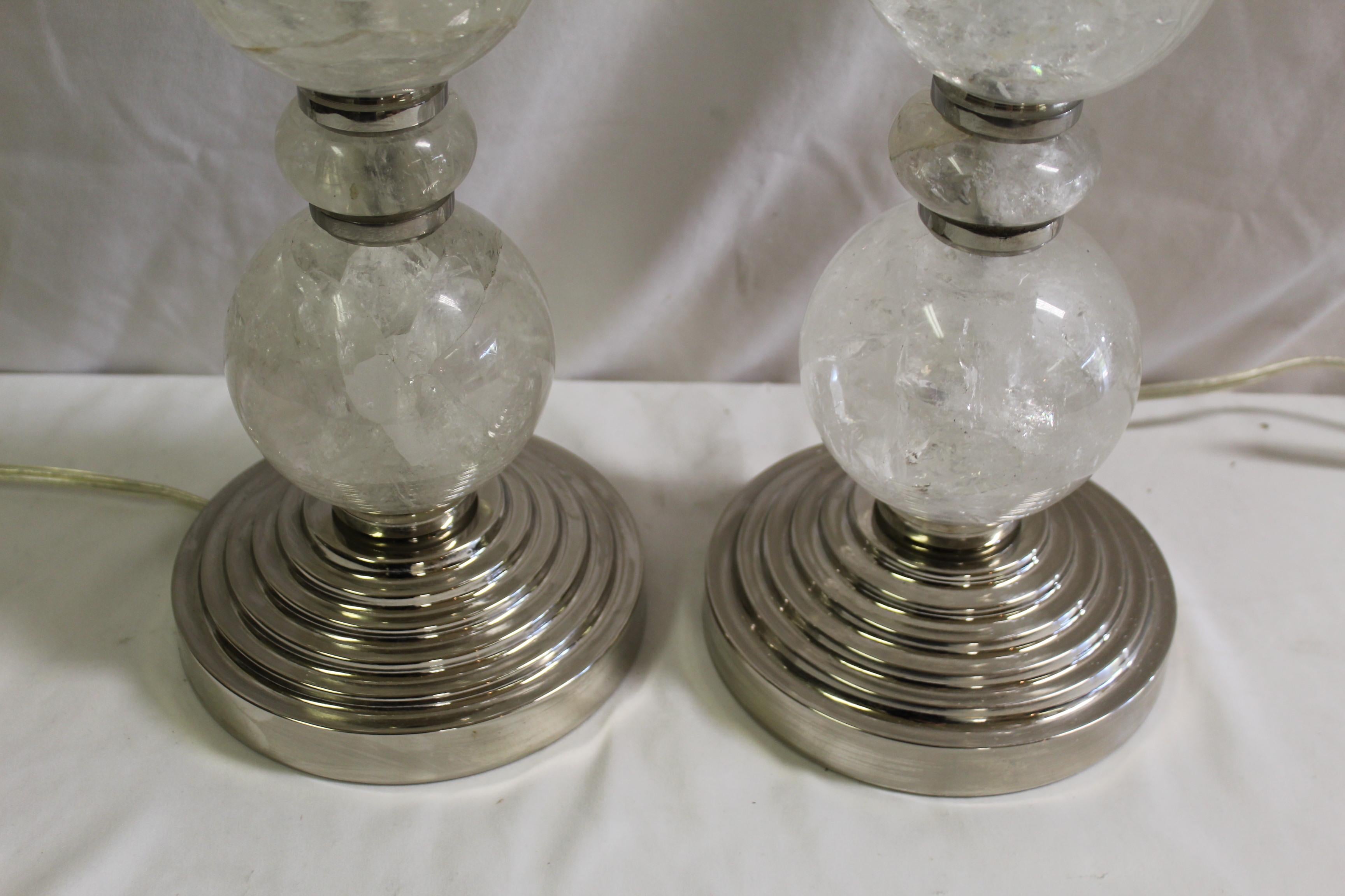 Custom designed by a well known Designer in Los Angeles . Custom mad for the Lighting showroom . Rock Crystal spheres and spacers were made in Brazil  . The metal spacers were designed to hold the Rock Crystal and finished in Hi-polished Nickel .