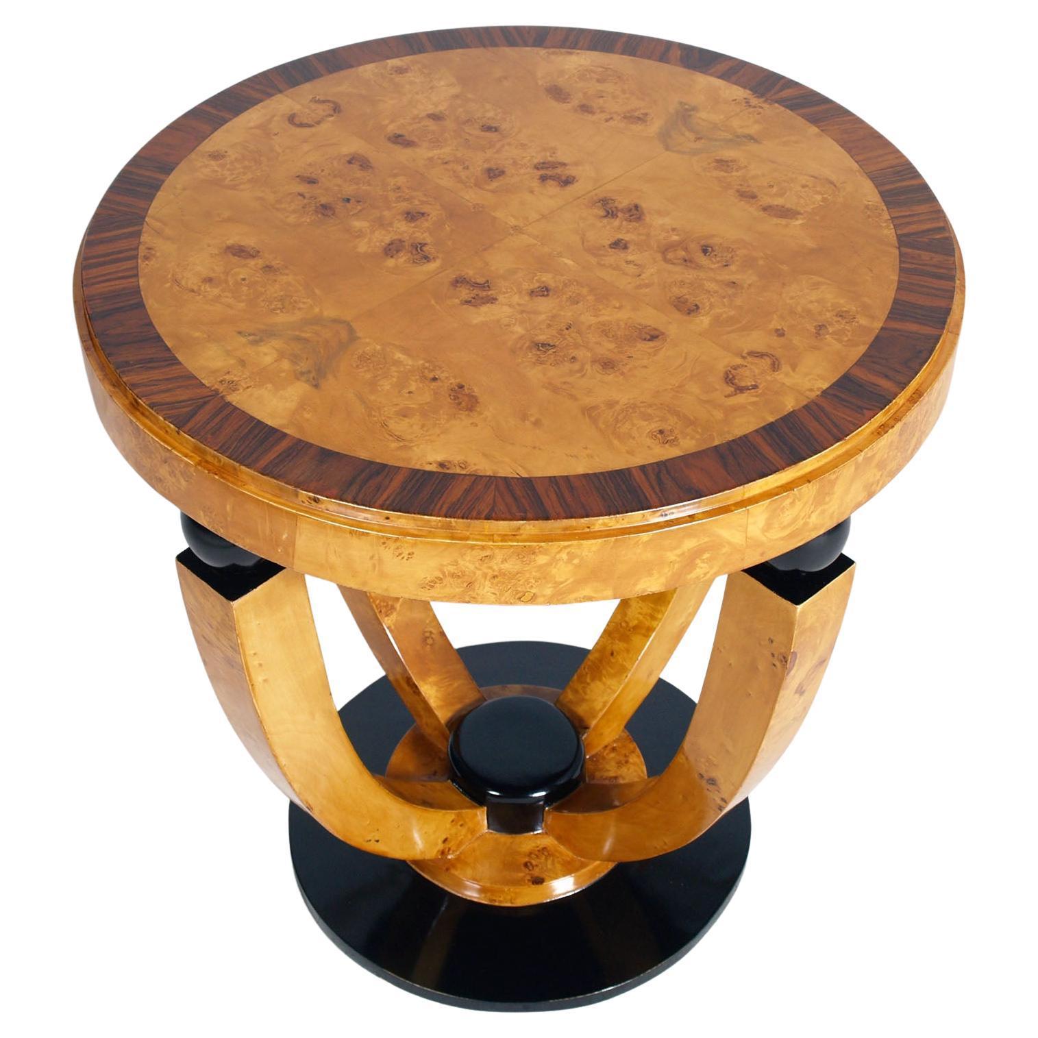 A striking example of Italian Art Deco design, this round side table was produced in the 1940s and bears the original label 