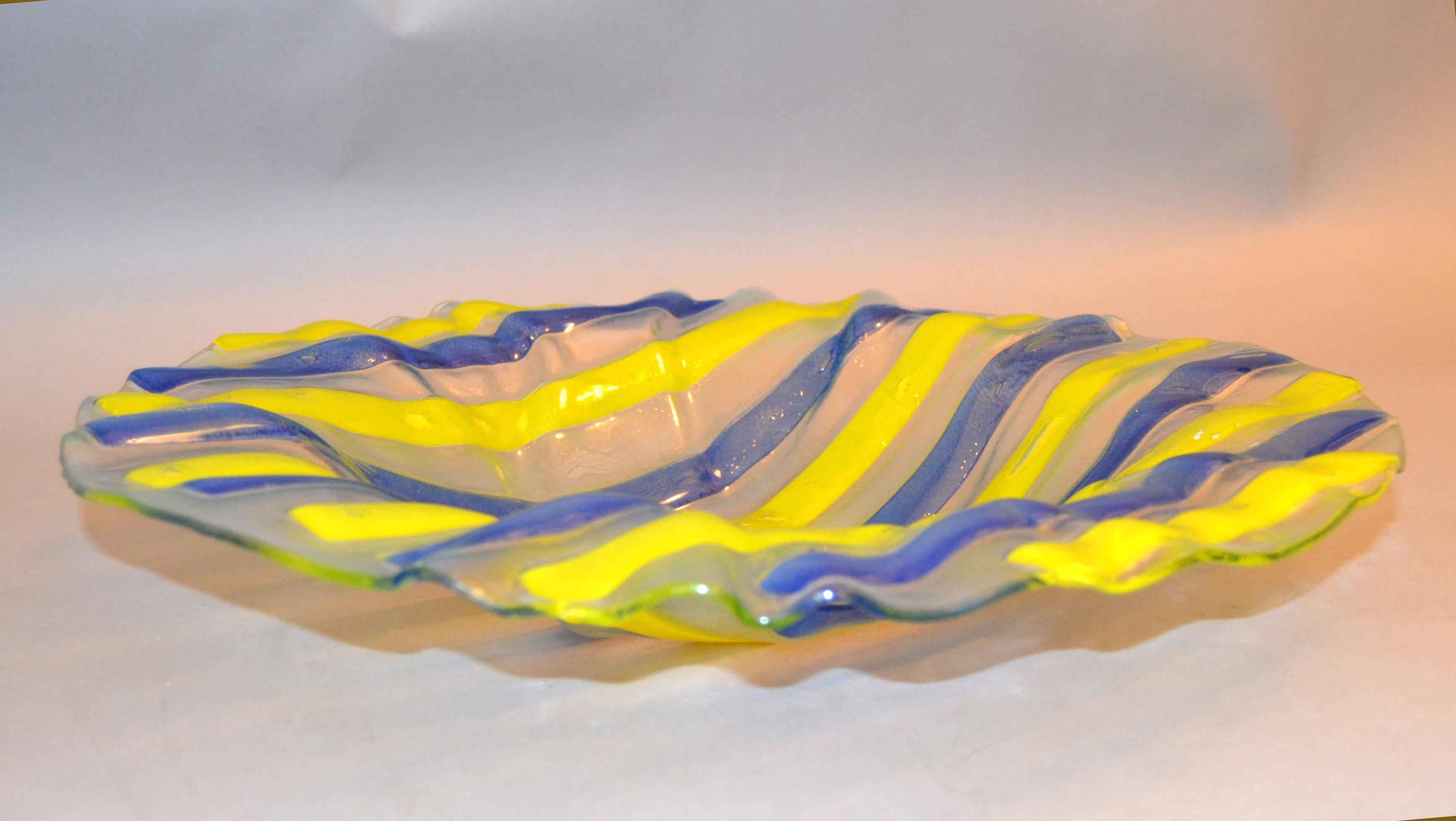 Mid-Century Modern blue, yellow and clear art glass centerpiece / bowl / plate styled after Higgins.
No markings.