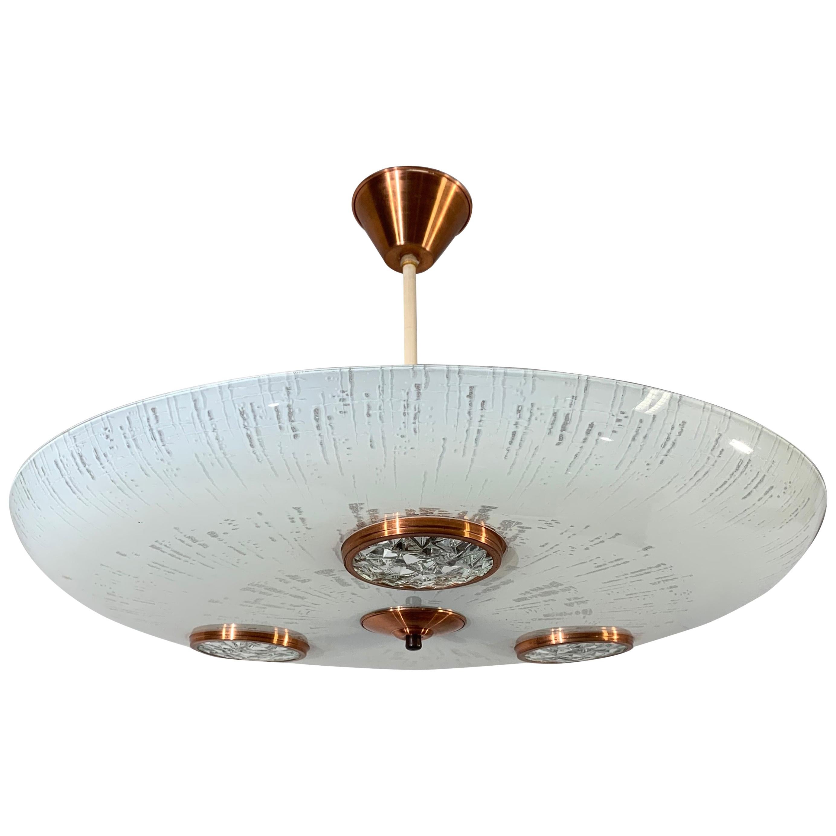 Rare copper and frozen glass flush mount with built-in 'portholes'.

If you are looking for a unique light from the Mid-Century Modern era then this work of (lighting) art could be the one for you. This unique design is unlike anything we ever saw