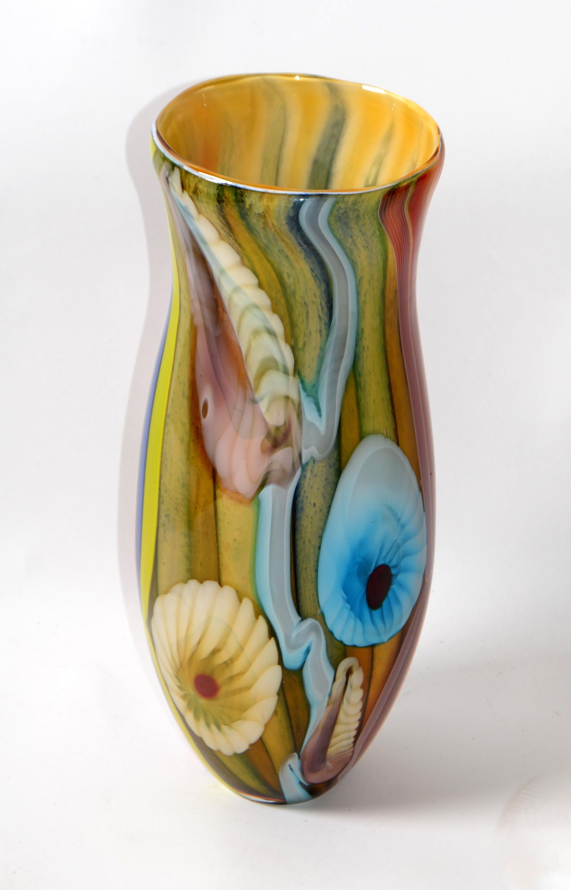 Heavy beautiful art glass Vase in hues of green, blue and bronze dust with Nautical Motif.
Comes from the Eastern European Polish Nation.
Beautifully crafted and flowing color brilliance.