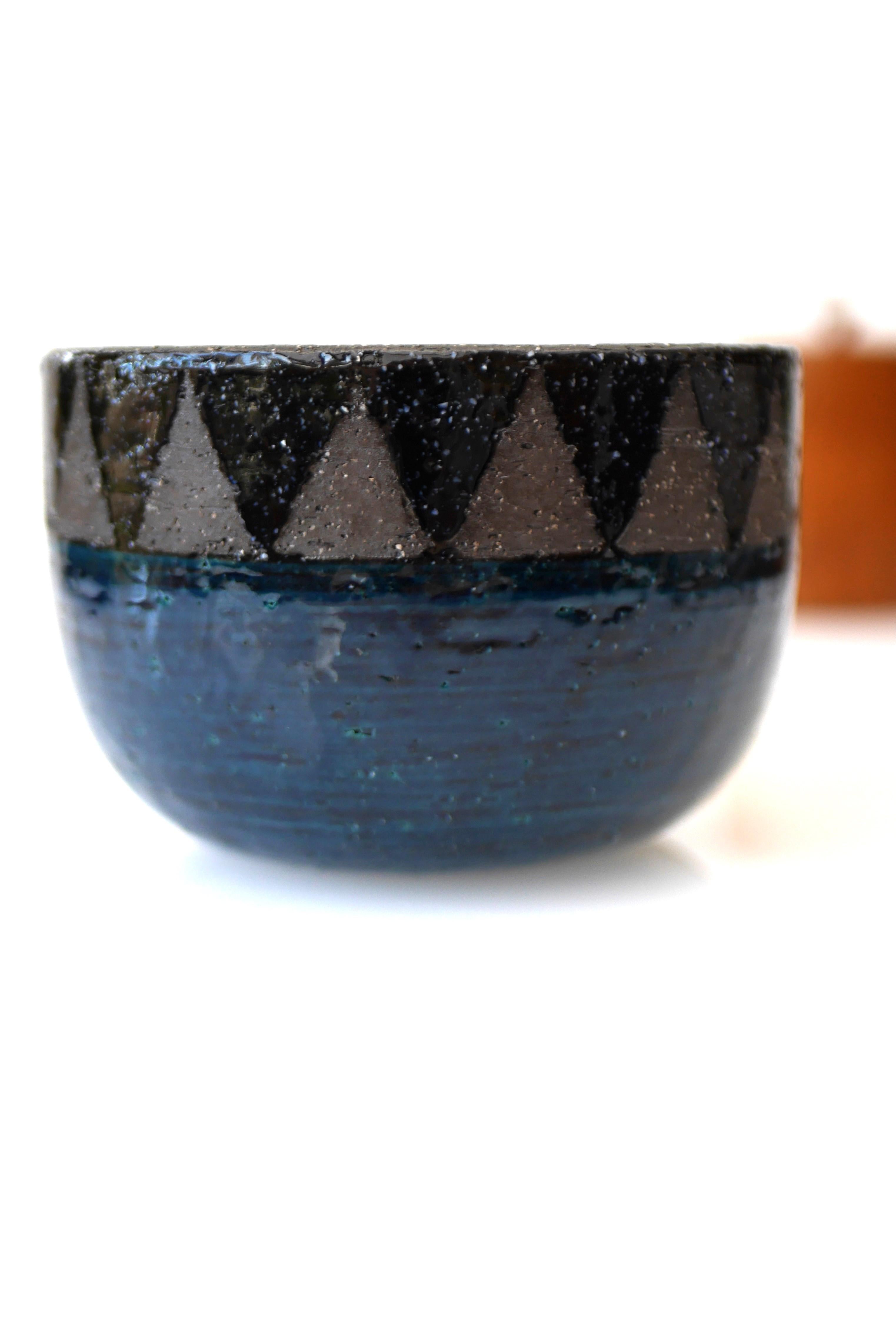 A signed studio production art ceramic bowl by Inger Persson for Rörstrand, Sweden. As most of her work this is a small studio product, a small bowl or flowerpot which is very rare and has an unusual pattern in the glazing. As always, her work is