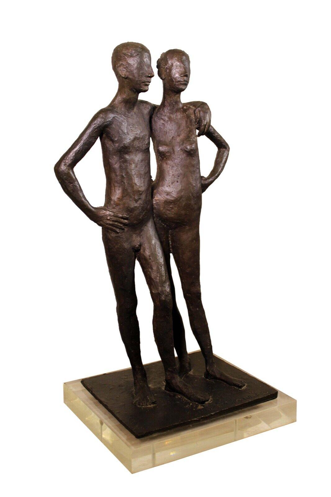 A contemplative bronze sculpture depicting a nude couple by Detroit based artist Arthur Schneider. Signed on the bottom right in the block stand. A romantic and intimate sculpture that alludes to the motif of companionship. Dimensions: 14.5