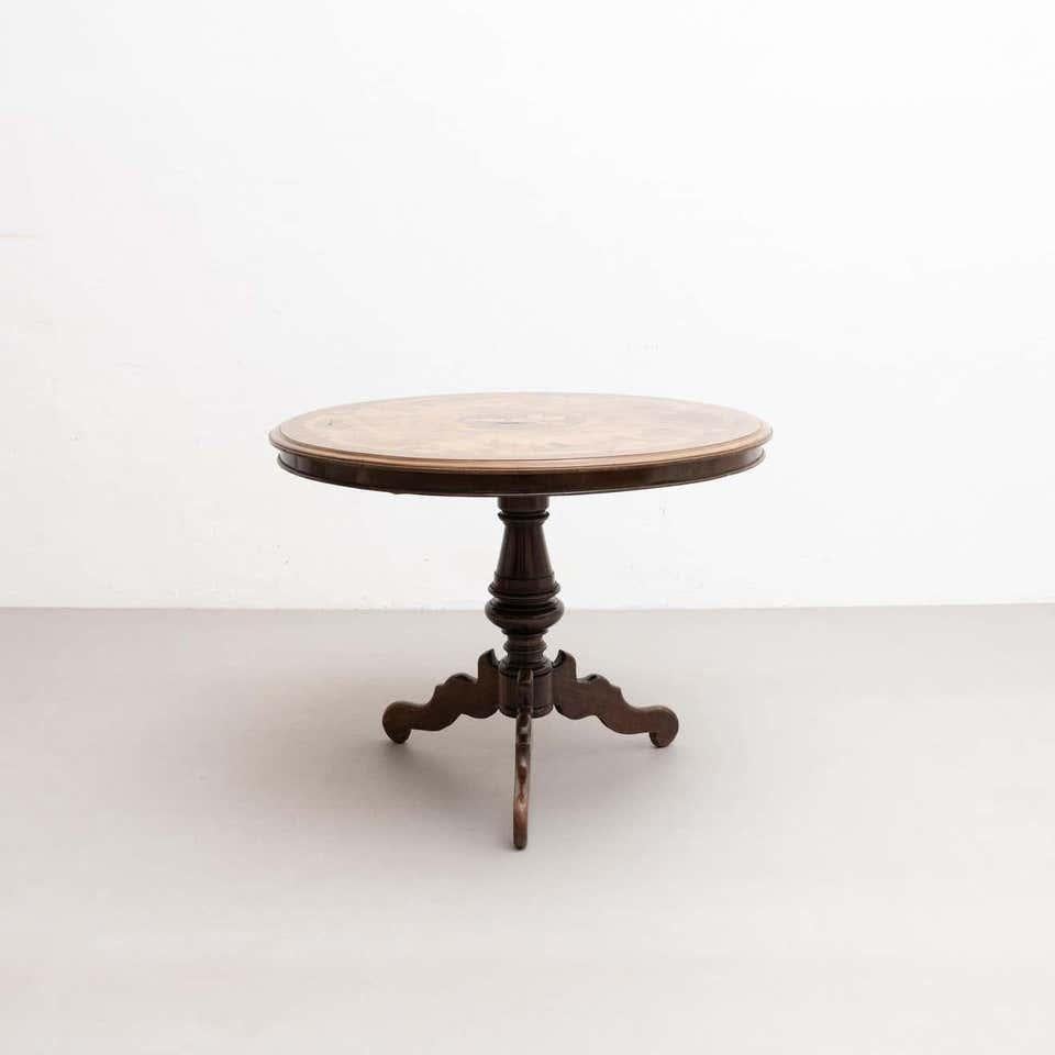 Articulated side table manufactured by unknown designer in Spain.

In a traditional style with a beautiful design.

Circa 1940

In original condition, with minor wear consistent of age and use, with some minor looses as shown on the