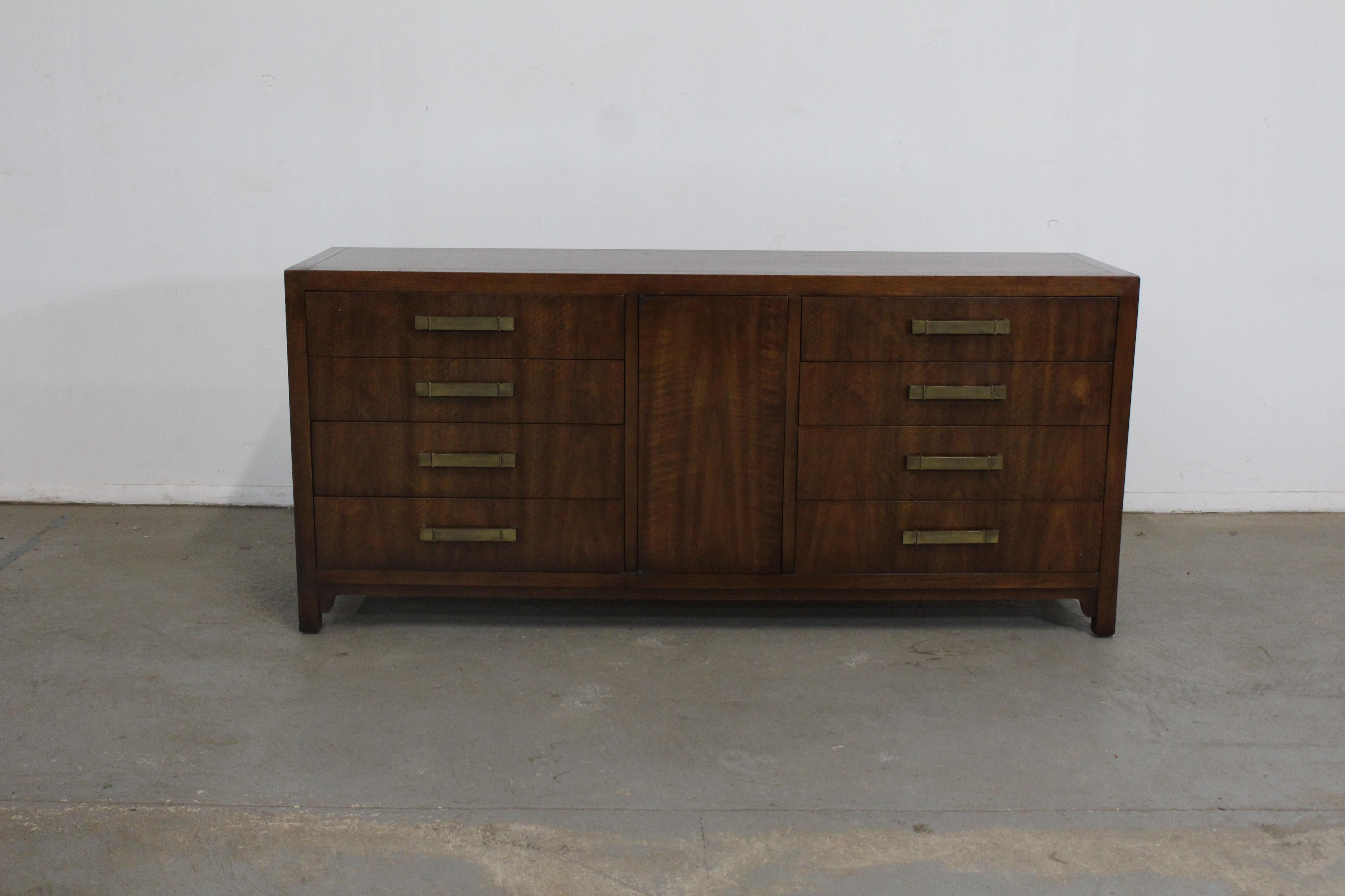 Mid-Century Modern Asain Credenza/Dresser Black Mahoghany by Heritage Furniture

Offered is a beautiful mid-century modern Asian-style credenza, made by Heritage. This piece will add style to any space or design project. We also have amtching Chest