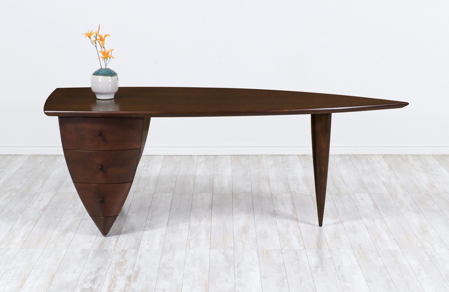 Mid-Century Modern asymmetrical executive desk after Wendell Castle.