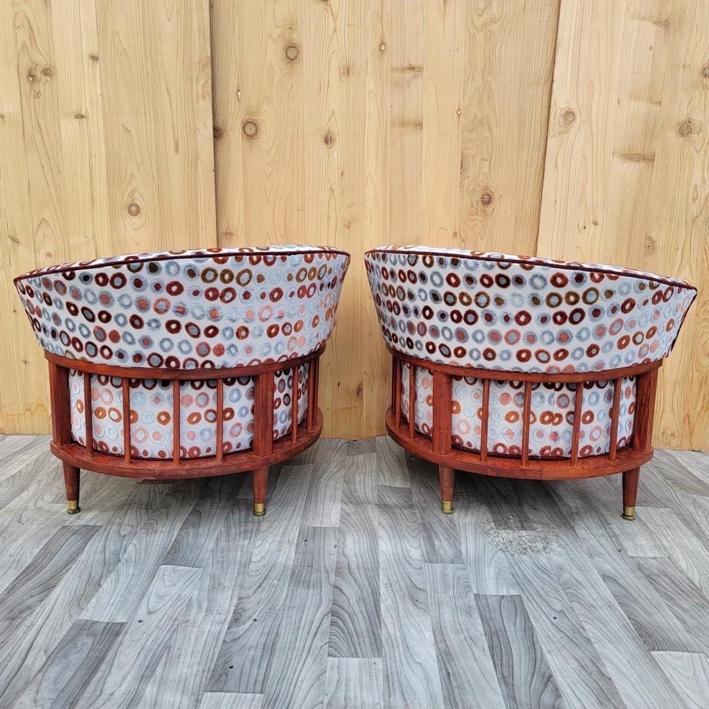Mid-Century Modern Atomic Barrel back club chairs newly upholstered - pair

This is a fantastic, stylish pair of vintage modern atomic club chairs with wood spindle back frames. These chairs feature channeled barrel back seats with tapered legs
