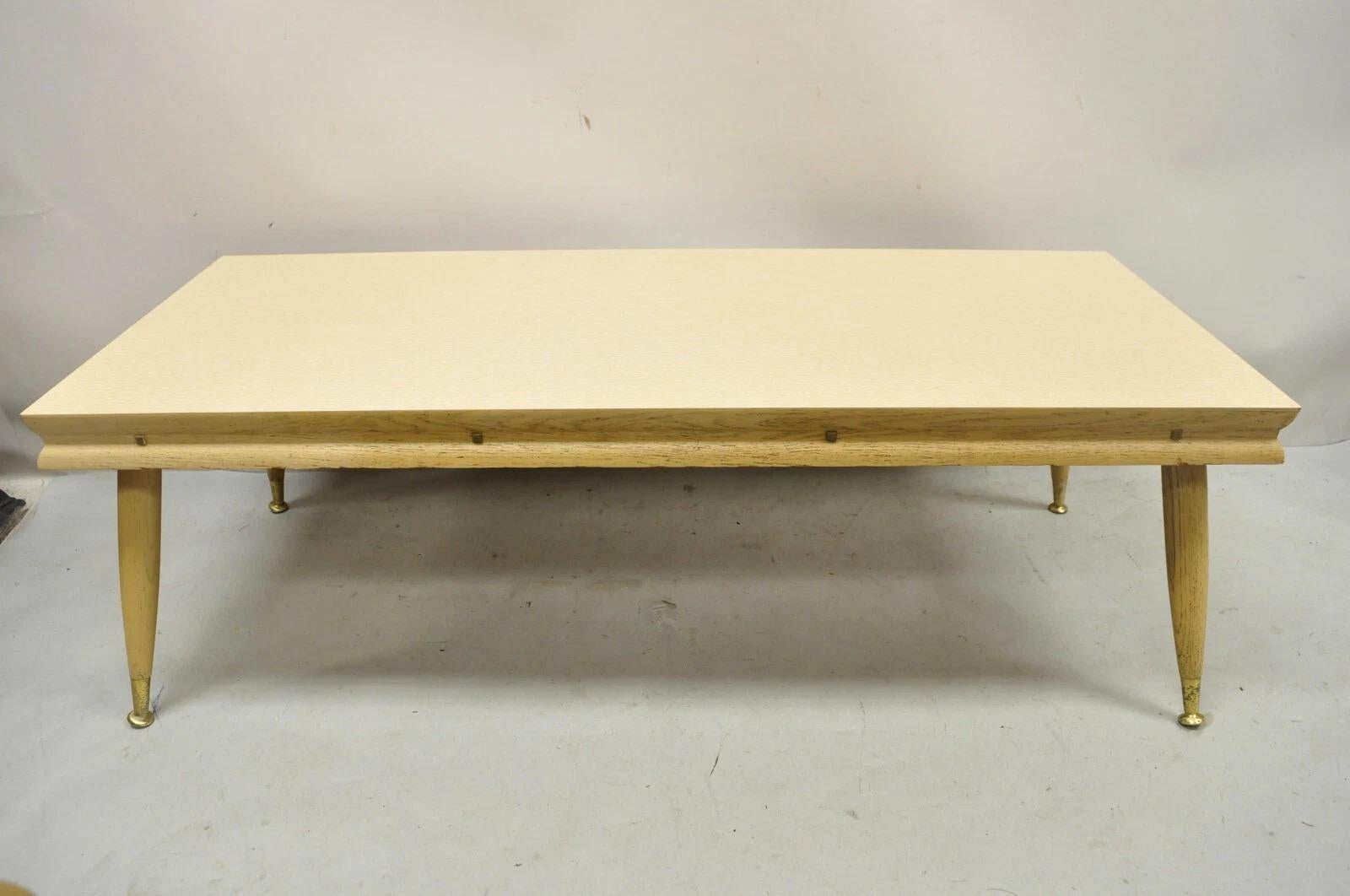 Please message us with your zip code to request a more reasonable domestic U.S. shipping quote.

Item: Mid Century Modern Atomic Era Laminate & Wood Coffee Table Set - 3 pc Set
Details: (2) End tables, (1) Coffee table, laminate tops, tapered legs,