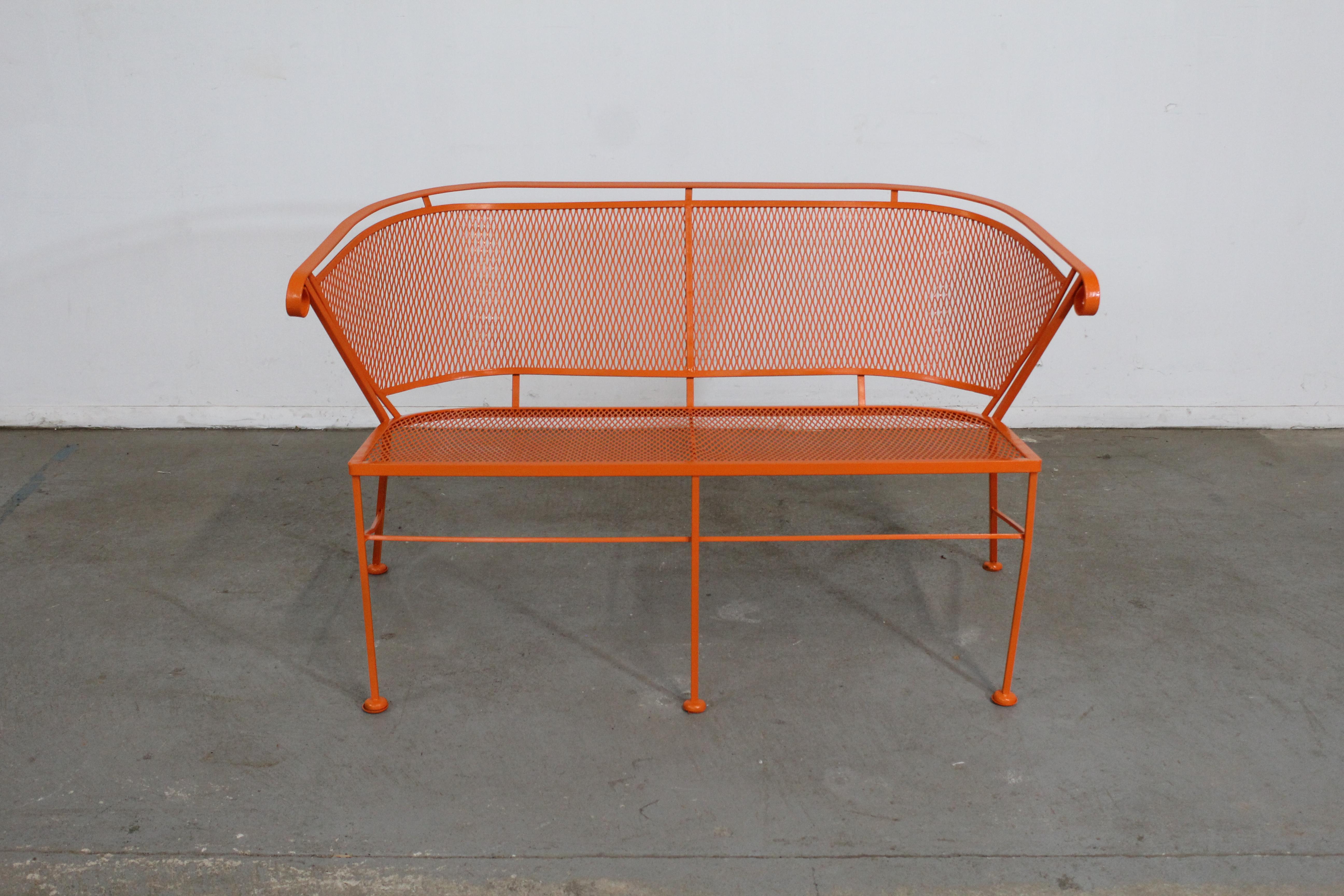 Mid-Century Modern atomic orange Salterini style outdoor metal curved back bench

Offered is a Mid-Century Modern atomic orange Salterini style outdoor metal curved back bench, circa 1960's. This bench has been repainted in an atomic orange. It is