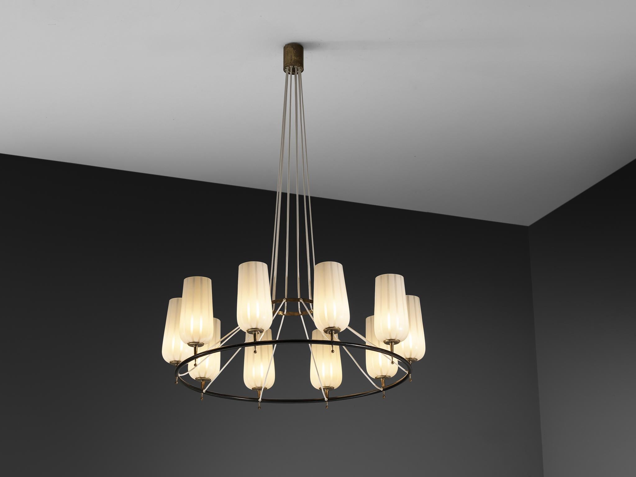Chandelier, satin glass, brass, lacquered steel, Austria, 1950s

A beautiful mid-century Austrian design from the 1950s, reflecting the era's emphasis on clean lines and modernist elegance. At its core, the design is centered around a circular