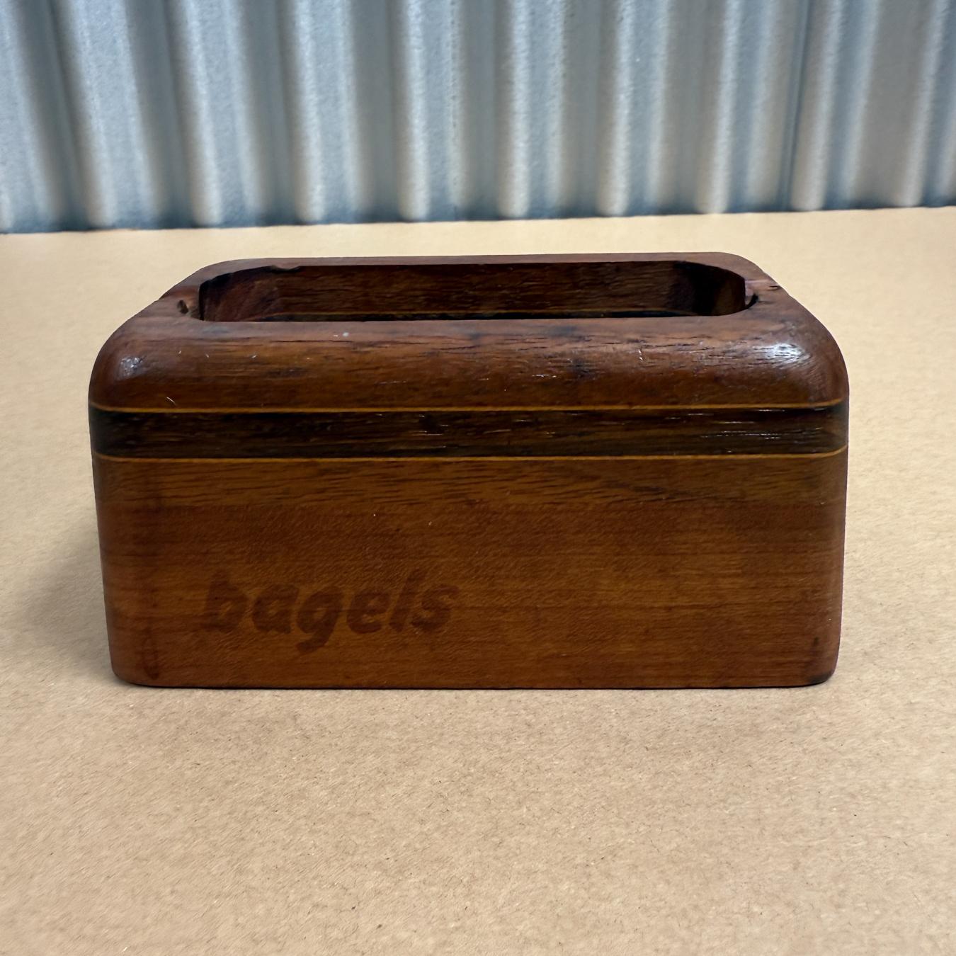 For your consideration a Mid-Century modern bagel wood slicer.  Custom made. USA circa the 1980s
Dimensions:5.38 x 2.88 w x 2.63 h

Please visit take a look at our listings, we have an amazing curated collection of hard to find items.

