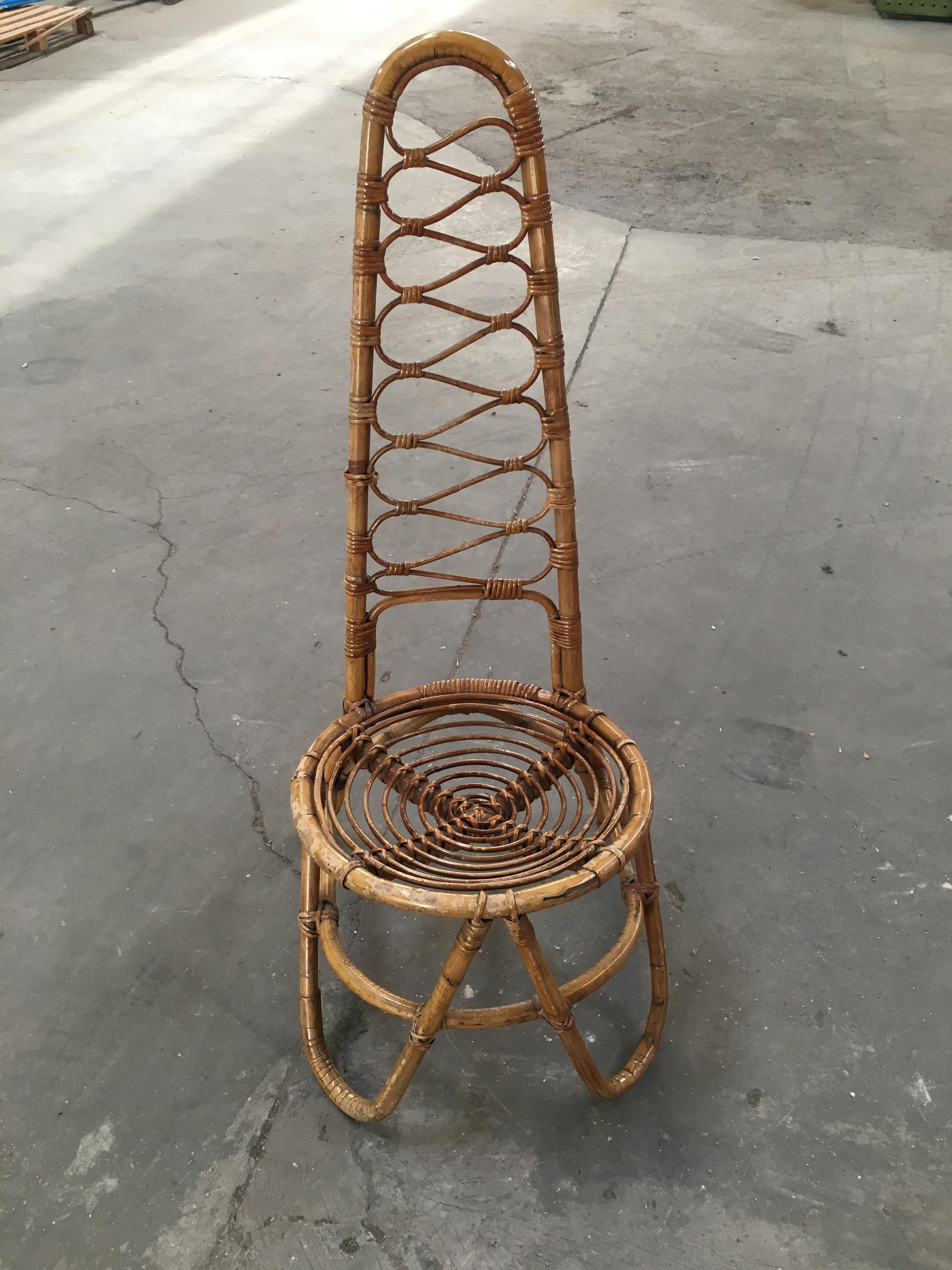 French Riviera bamboo and rattan chair with high single back from 1960s.
This item is in good vintage condition. Wear consistent from age and use.
 