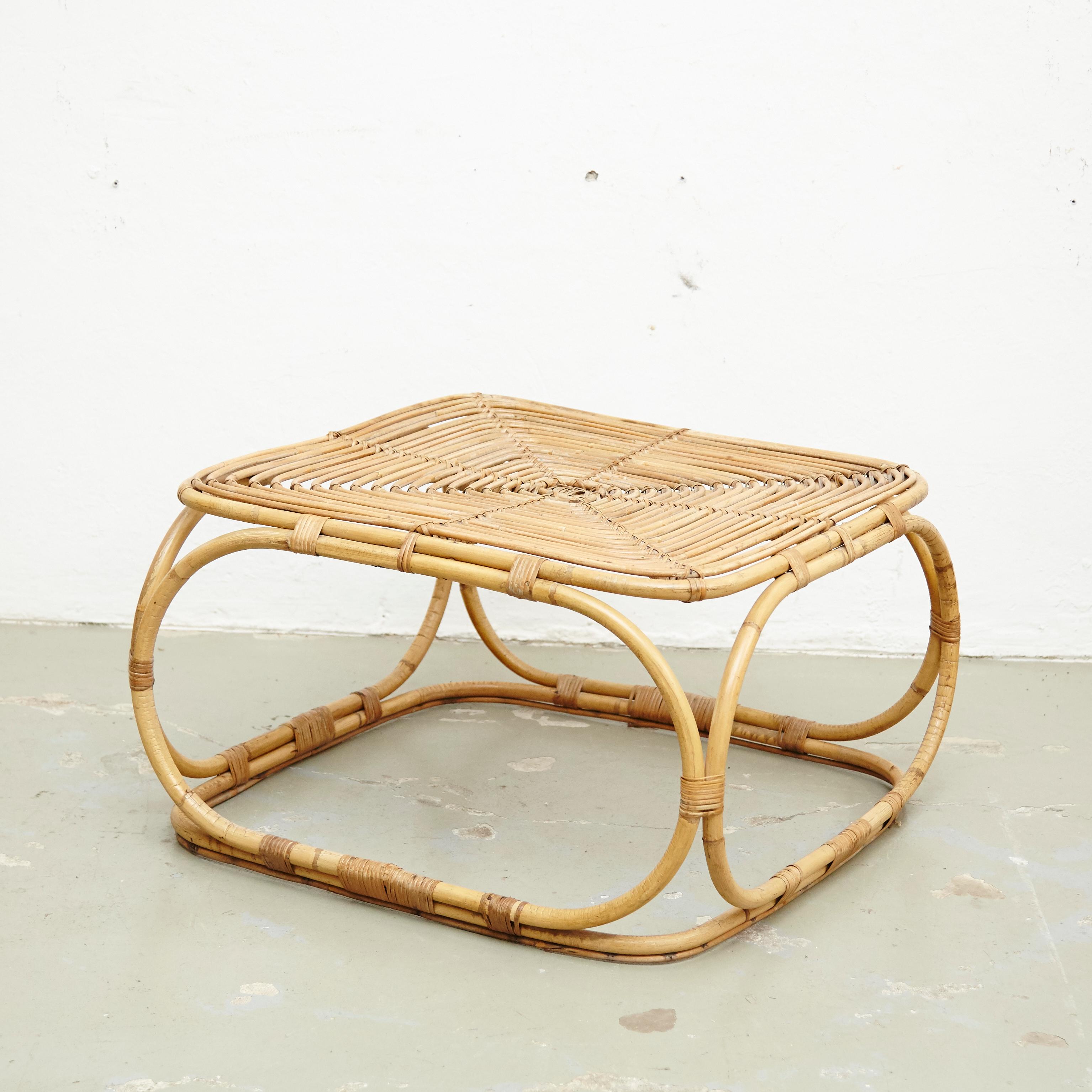 Mid-Century Modern bamboo and rattan side table, circa 1960
Traditionally manufactured in France.
By unknown designer.

In original condition with minor wear consistent of age and use, preserving a beautiful patina.

  