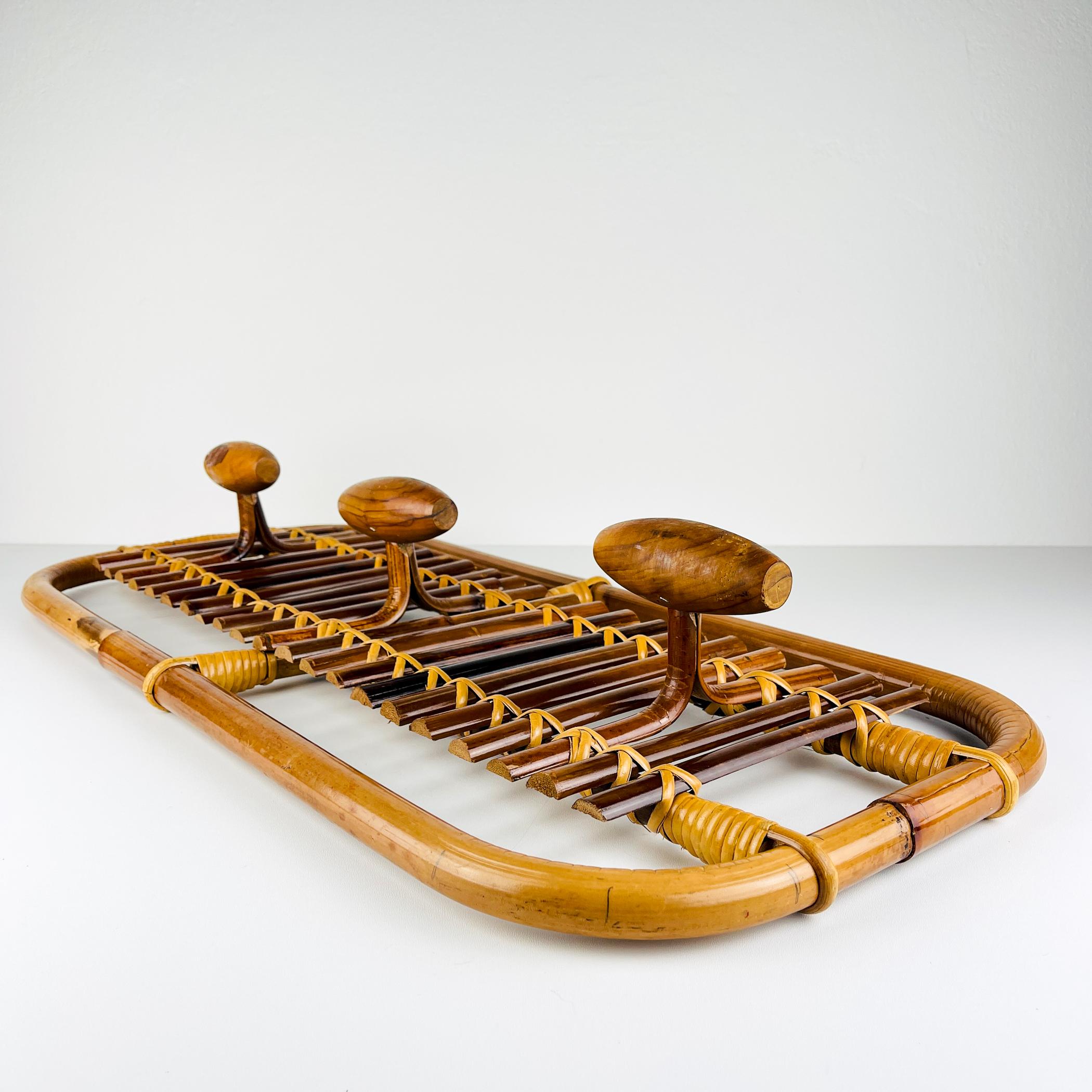 Mid-century modern Bamboo & Rattan Coat Rack by Olaf von Bohr made in Italy, 1950s.
Olaf von Bohr is an austrian designer born in Salzburg in 1927.
After learning the woodworking and furniture manufacturing process at the Munich school, he moved to