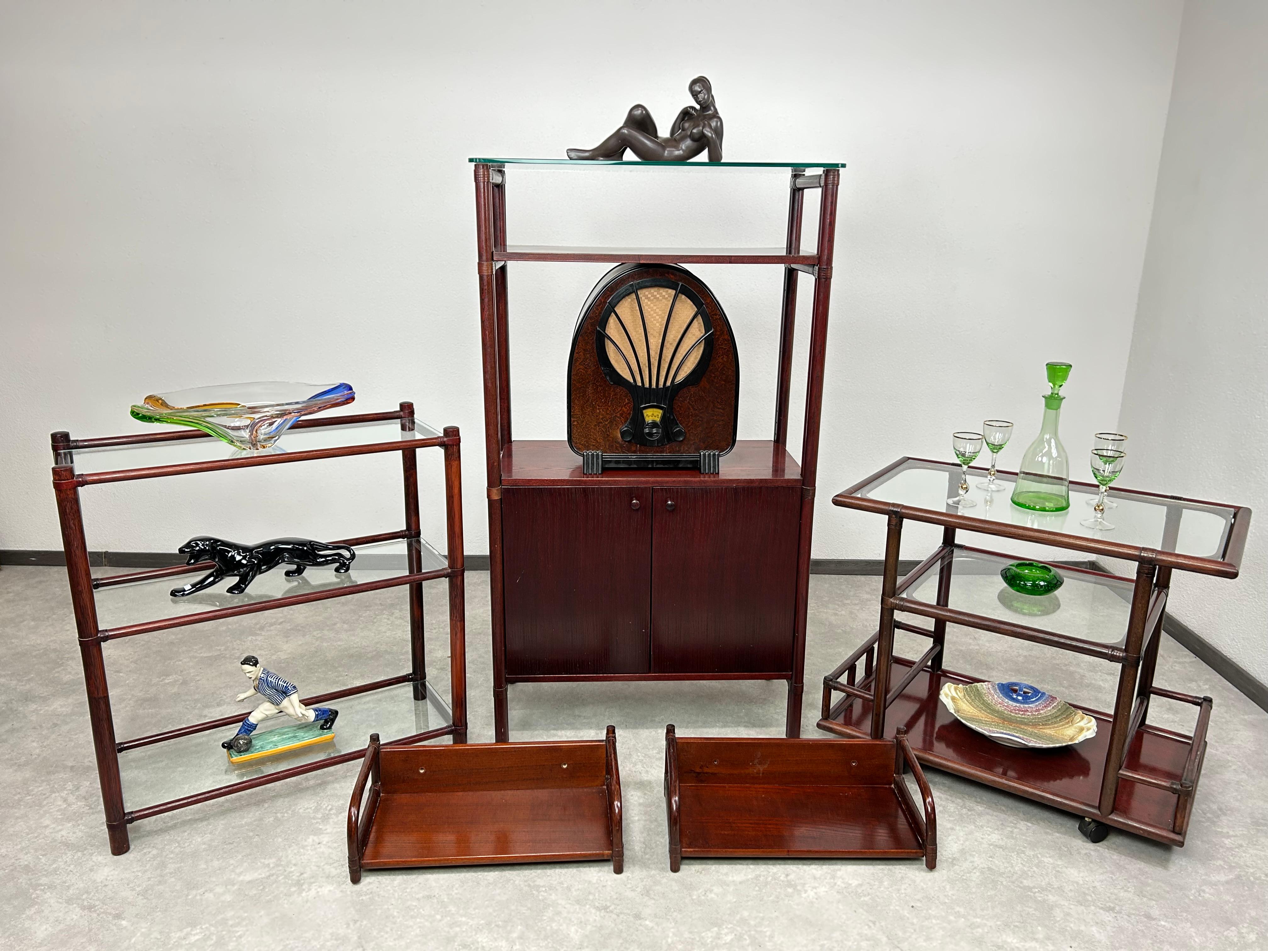 Mid-century modern bamboo etagere by Gervasoni in excellent original condition with signs of use. Several small chips on glass top edges.

Gervasoni is an Italian manufacturer of luxury, premium furniture that has been present on the market since