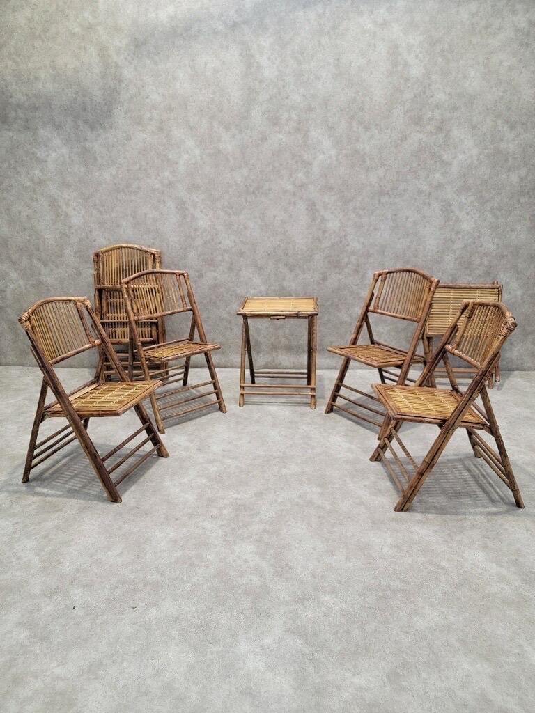 Chaises pliantes en bambou avec 2 tables d'appoint pliantes en bambou - 8 pièces 

Votre patio a besoin de cet ensemble de meubles d'extérieur en bambou rustique. Pratique pour votre espace, vous pouvez plier les chaises et les tables pour les