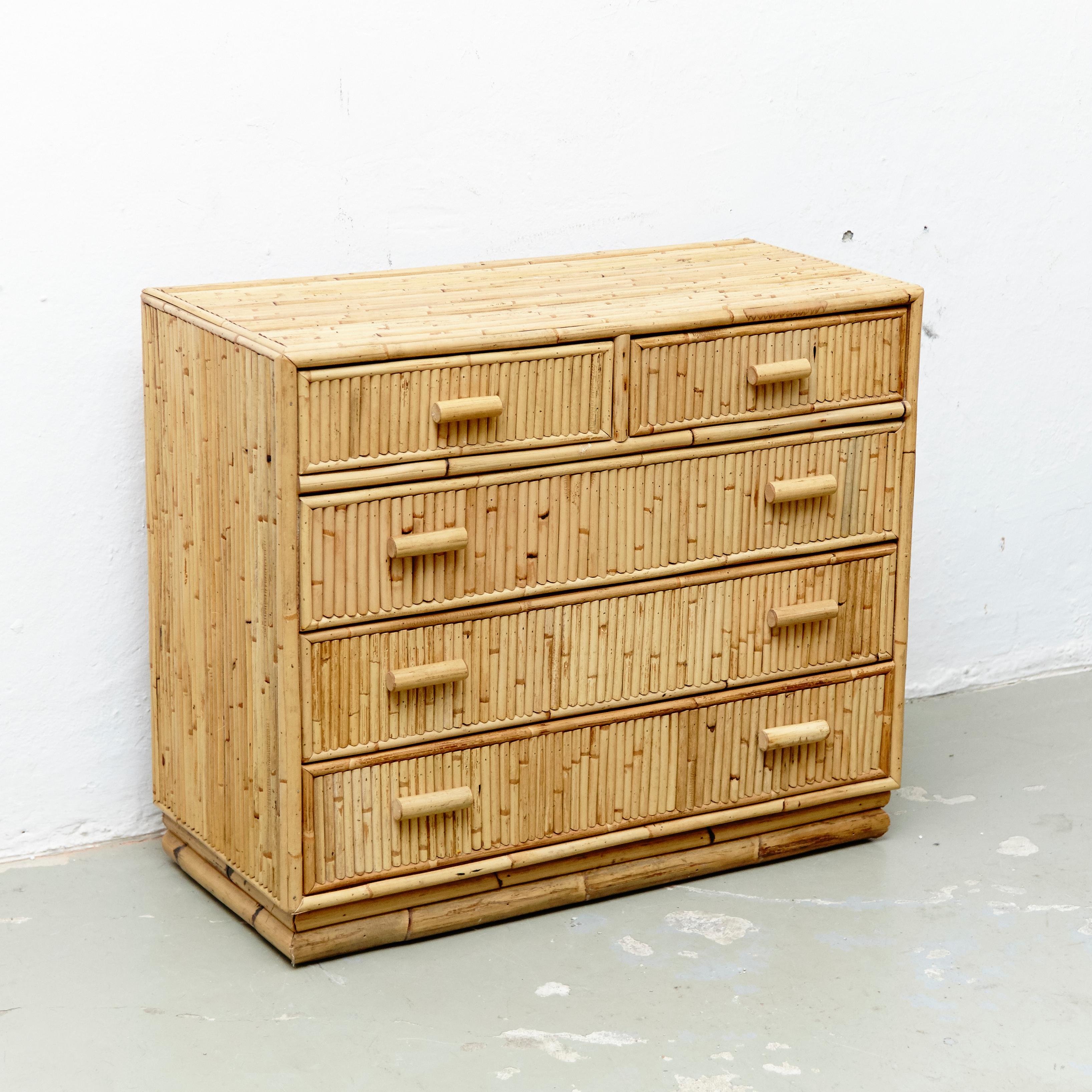 Mid-Century Modern bamboo sideboard, circa 1960
Traditionally manufactured in Spain.
By unknown designer.

In original condition with minor wear consistent of age and use, preserving a beautiful patina.

Beautiful rationalist lines, perfect