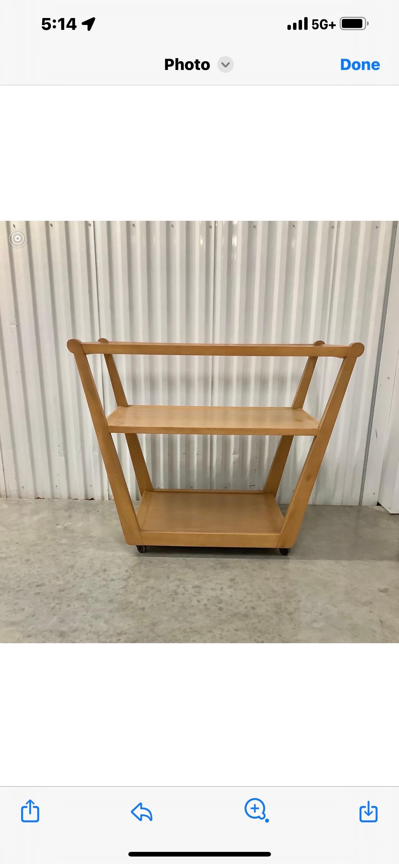 Mid Century Modern Bar Cart By Edward Wormley For Dunbar,.
Offered is a handsome mid century blond wood bar cart or serving cart from the Precedent series designed by Edward Wormley for Dunbar and manufactured by Drexel Furniture.
This shapely cart