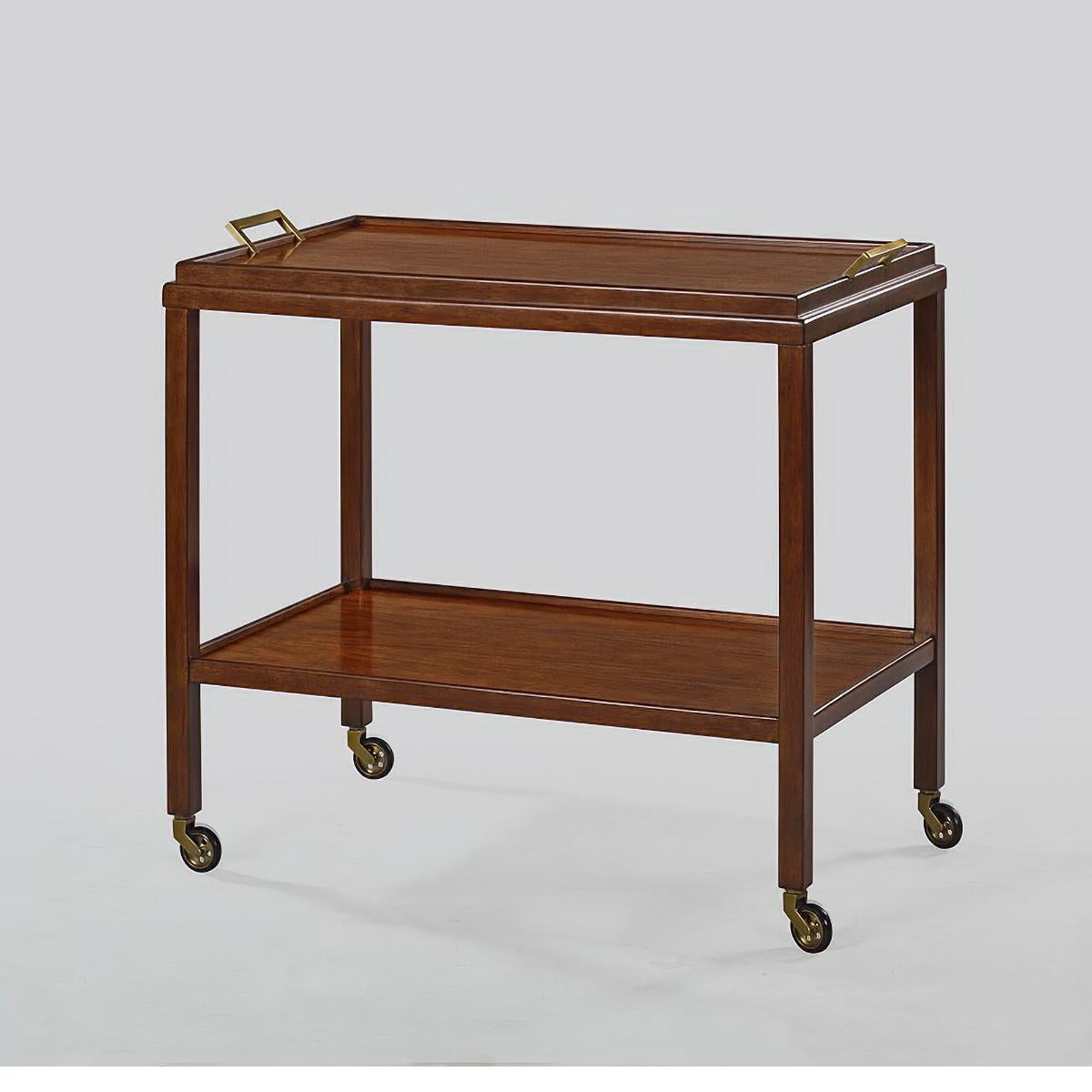 Mid-Century Modern bar cart with removable tray and shelf has hand-cast brass hardware and brass wheels with floor protective tread having a “rustic” warm brown walnut finish with subtle visual distressing and hand-rubbed finish.

Dimensions: 33