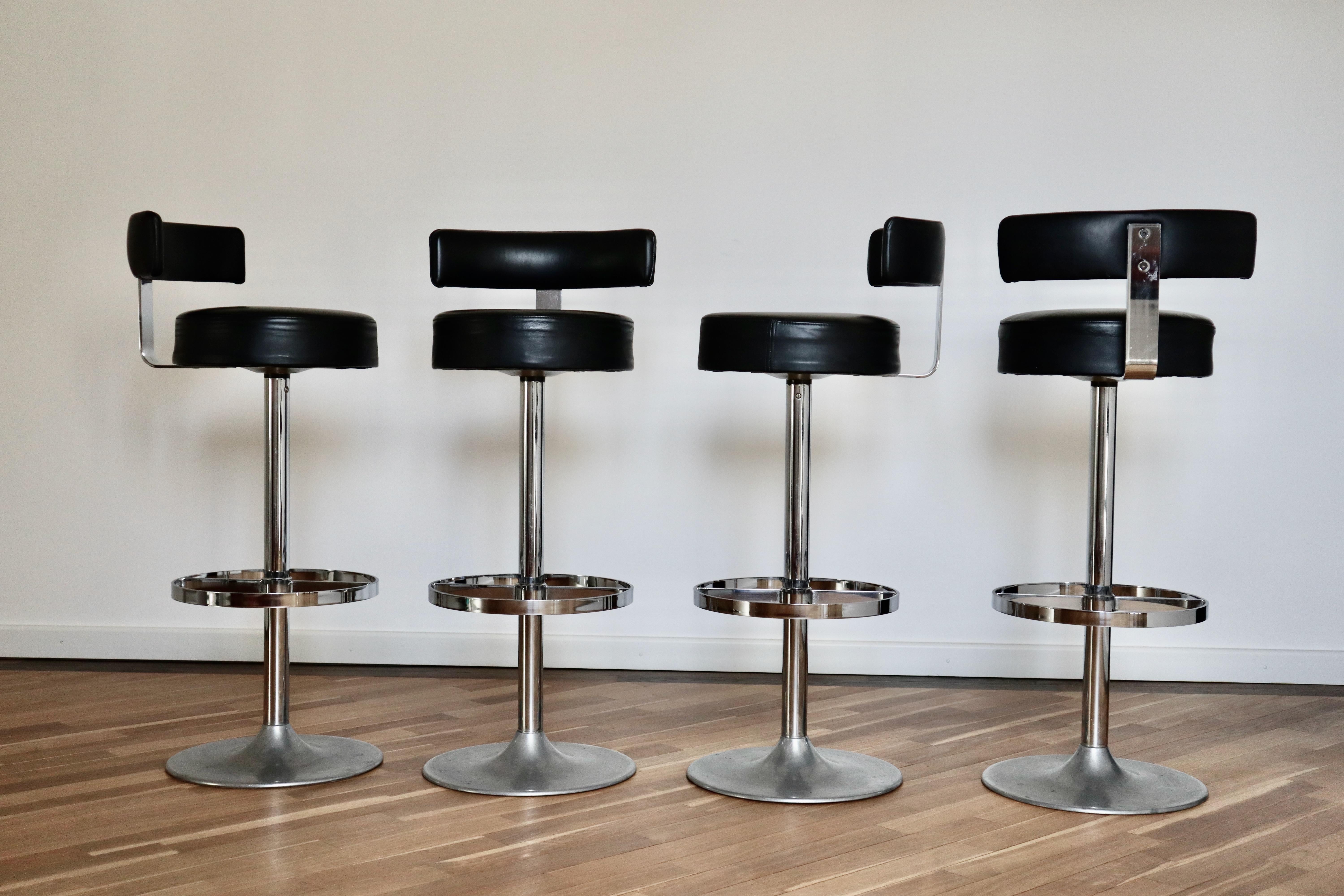 Set of four Mid-Century Modern bar stools in the Mid Century Modern Bauhaus Style of Le Corbusier, Marcel Breuer and friends. Made in Italy in 1970 with light and attractive patina for an authentic clean look, but not so heavy as to appear 