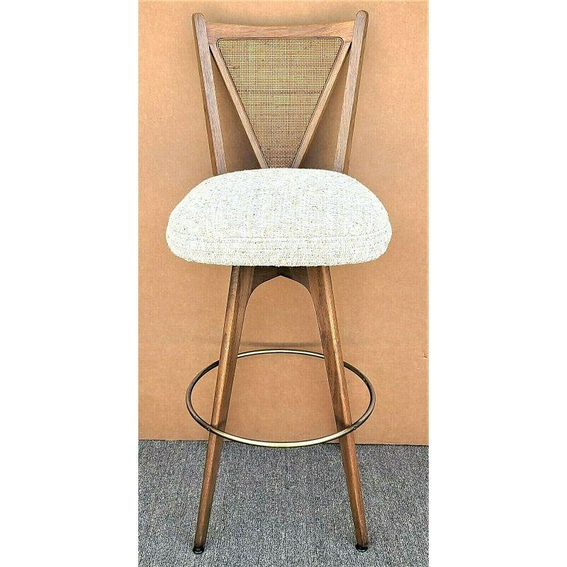 Offering one of our Recent Palm Beach Estate Fine Furniture Acquisitions of a 
Vintage Mid-Century Danish Modern caned back 360 swivel barstool

Approximate Measurements in inches
46
