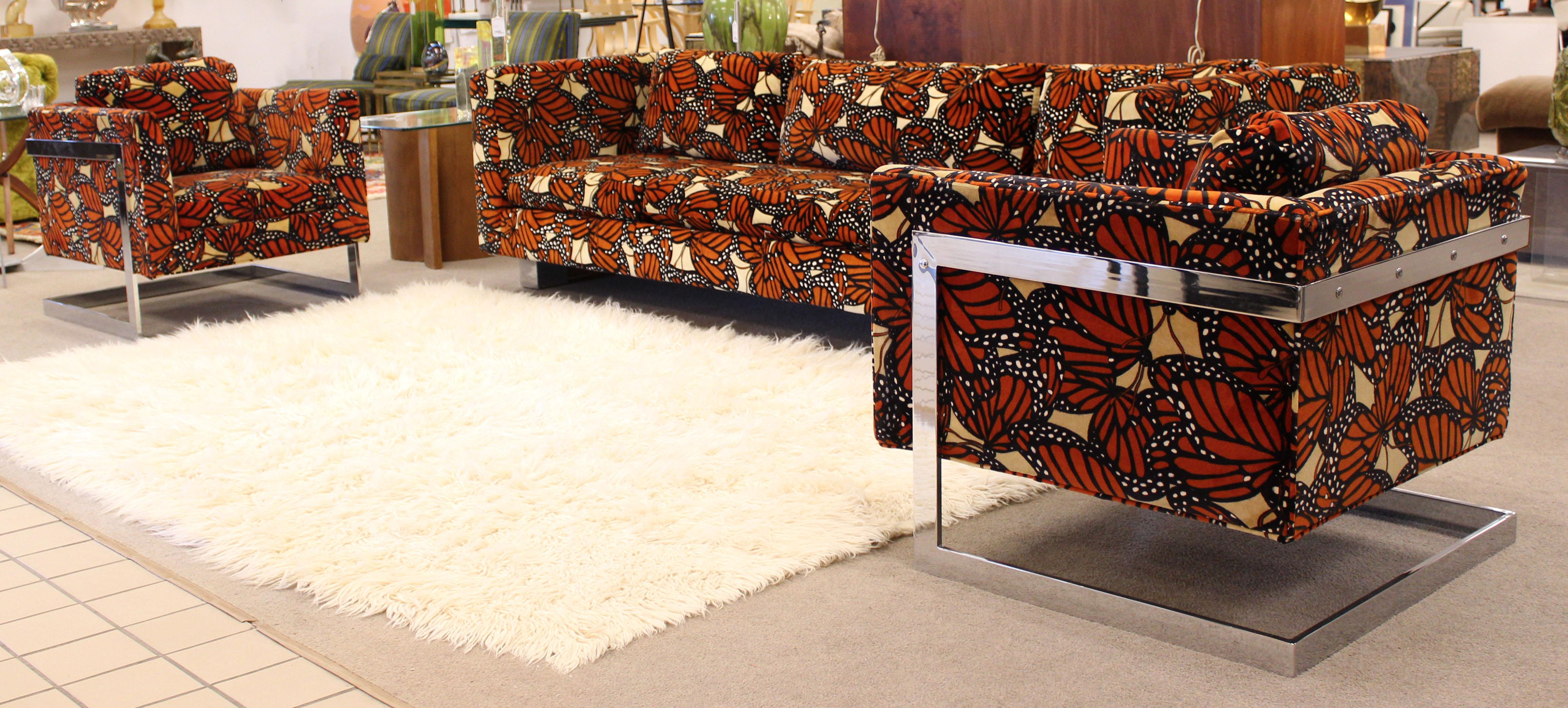 For your consideration is a radiant sofa and pair of lounge chairs set, by Milo Baughman, with a rich and rare Jack Lenor Larsen Monarch butterfly fabric, circa the 1970s. In excellent condition. The dimensions of the sofa are 96