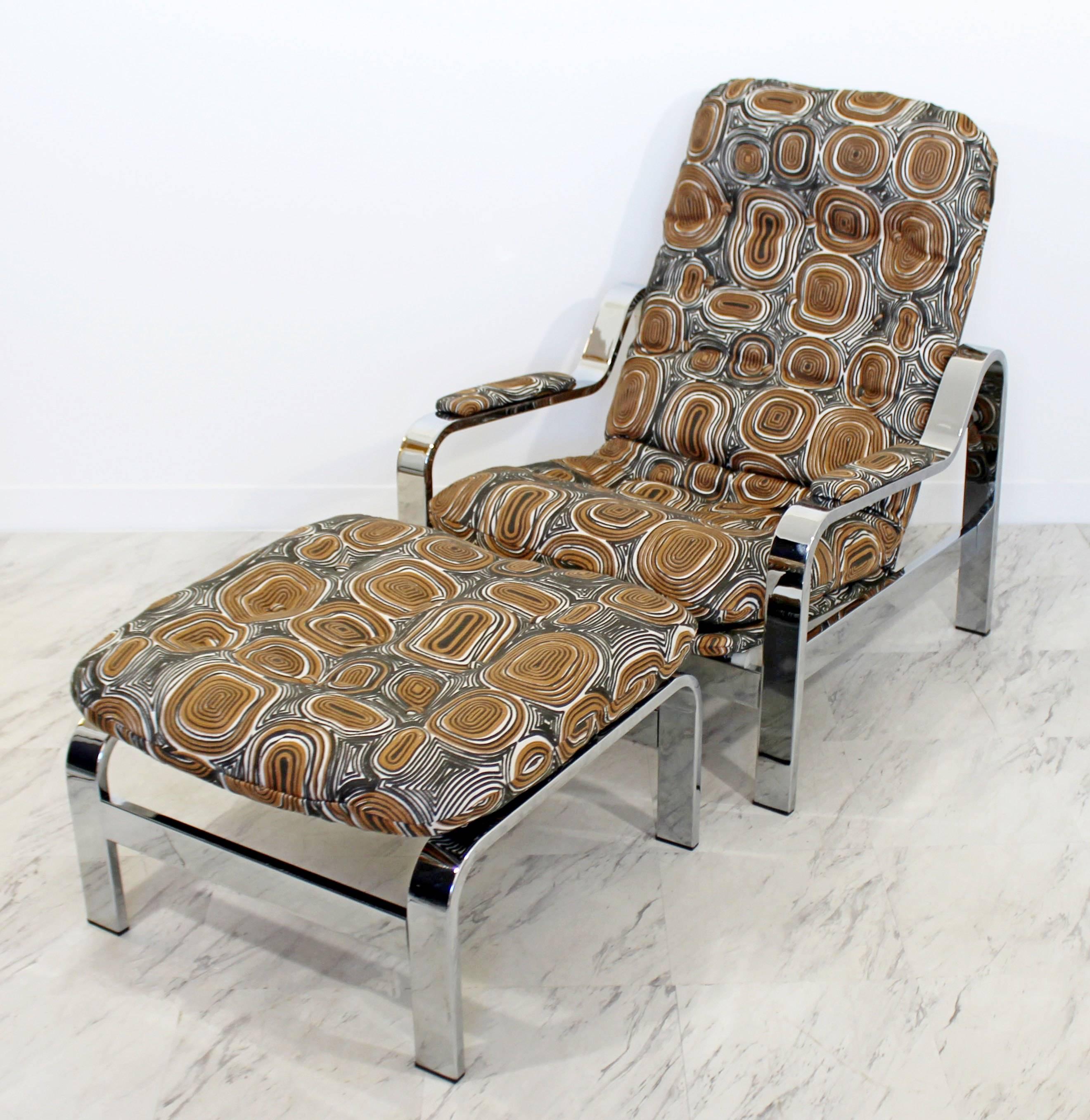 For your consideration is a magnificent reclining lounge chair and matching ottoman, on thick polished steel chrome bases, Milo Baughman for Selig, made in Italy, circa 1970s. In excellent condition. Just back from being professionally reupholstered