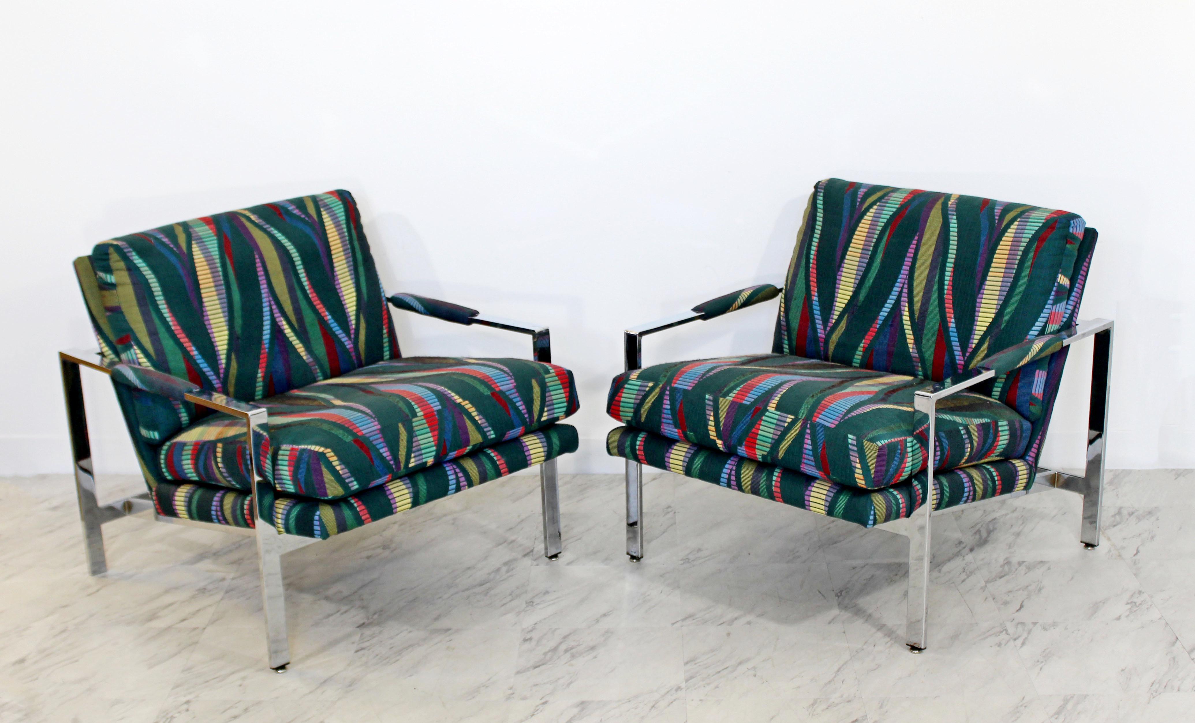 For your consideration is a wonderful pair of chrome cube armchairs, with a fabulous Jack Lenor Larsen style fabric, by Milo Baughman, circa the 1970s. In excellent condition. The dimensions are 28.5