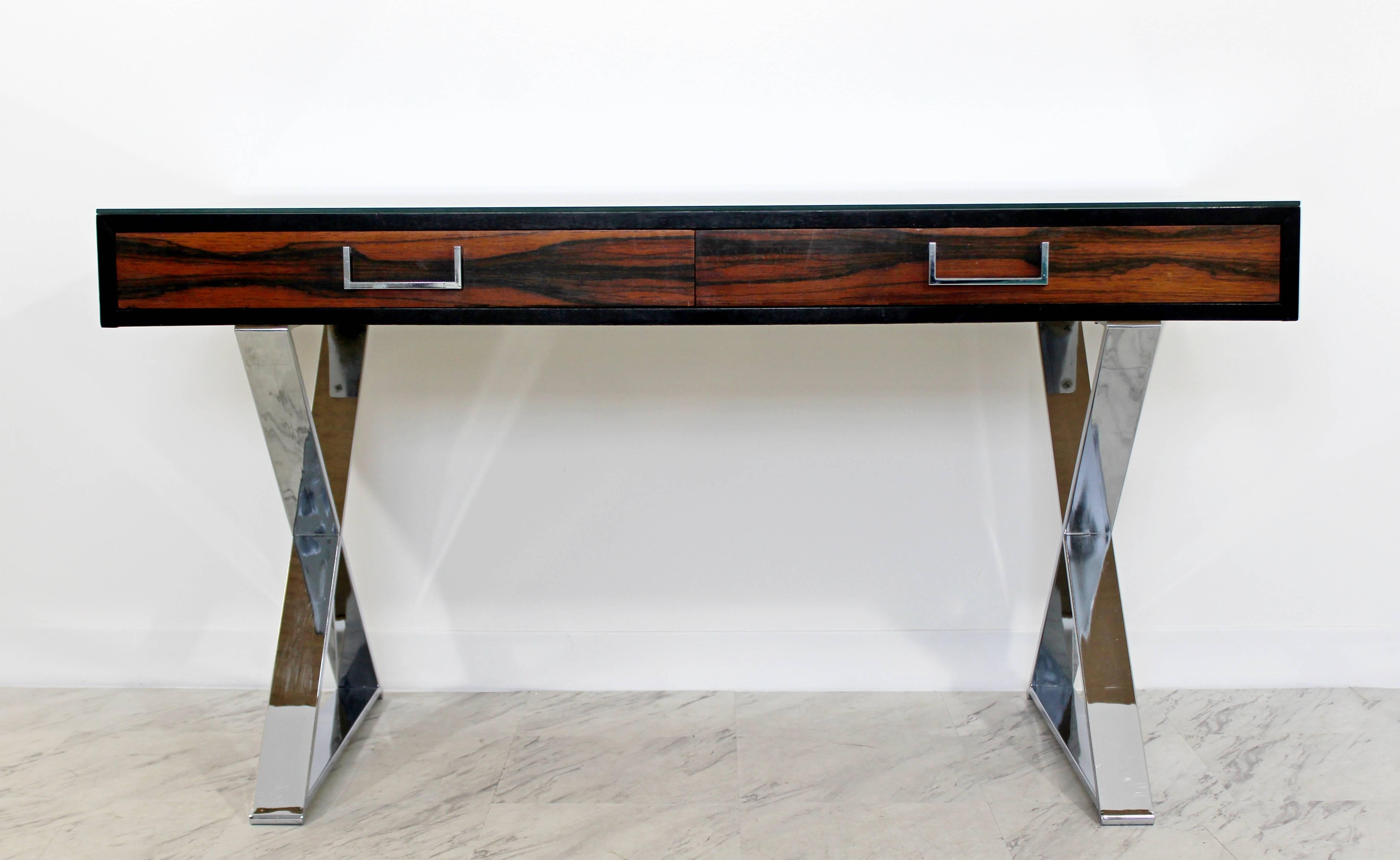For your consideration is a stunning Campaign desk by Milo Baughman for Thayer Coggin. This black lacquered desk features two spacious rosewood drawers with chrome pulls, a glass top and an 