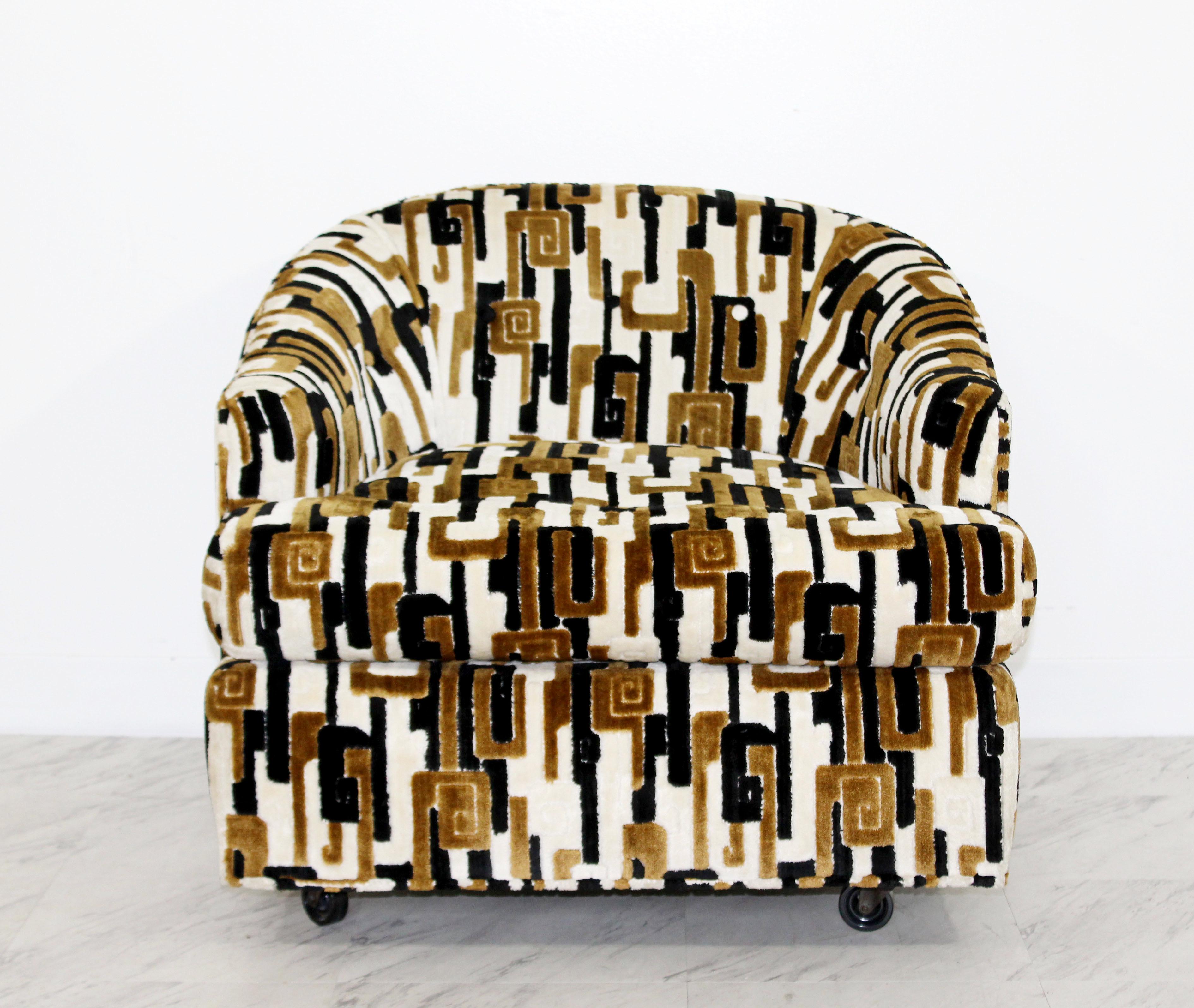 For your consideration is a beautiful lounge chair, on casters and with a brown & white patchwork velvet upholstery, by International Furniture, circa the 1960s. Upholstery attributed to Jack Lenor Larsen. In excellent condition. The dimensions are