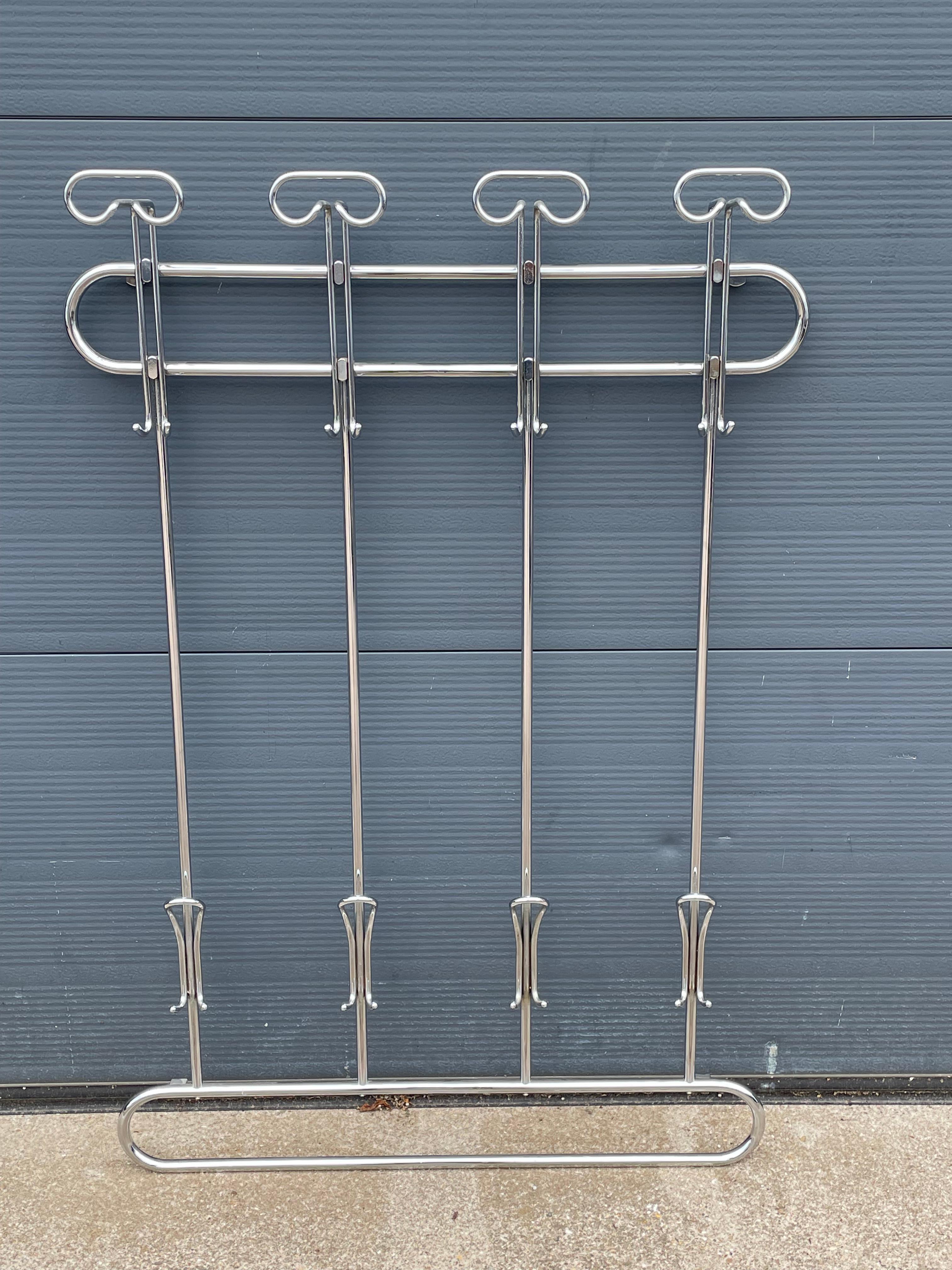 Great looking 1970s Bauhaus design wall coat rack with a rare & matching Hustadt flushmount.

We recently 'salvaged' this timeless and highly stylish, midcentury modern design set from the home of the first owner of this set (in Germany). It is