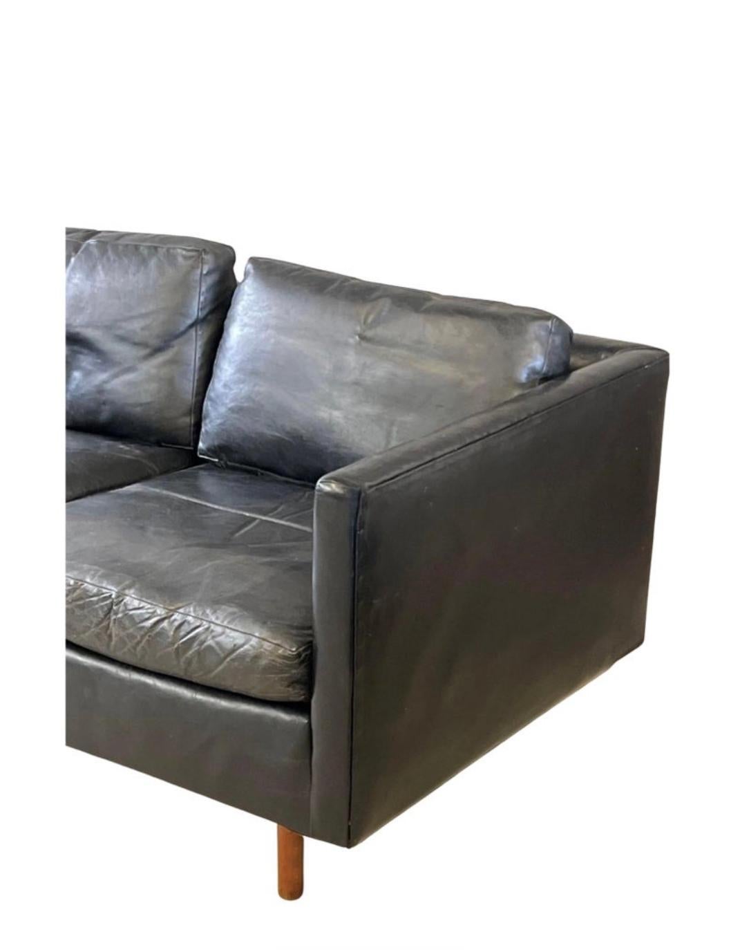 American Mid century modern beautiful Black leather 2 seat loveseat sofa with walnut legs