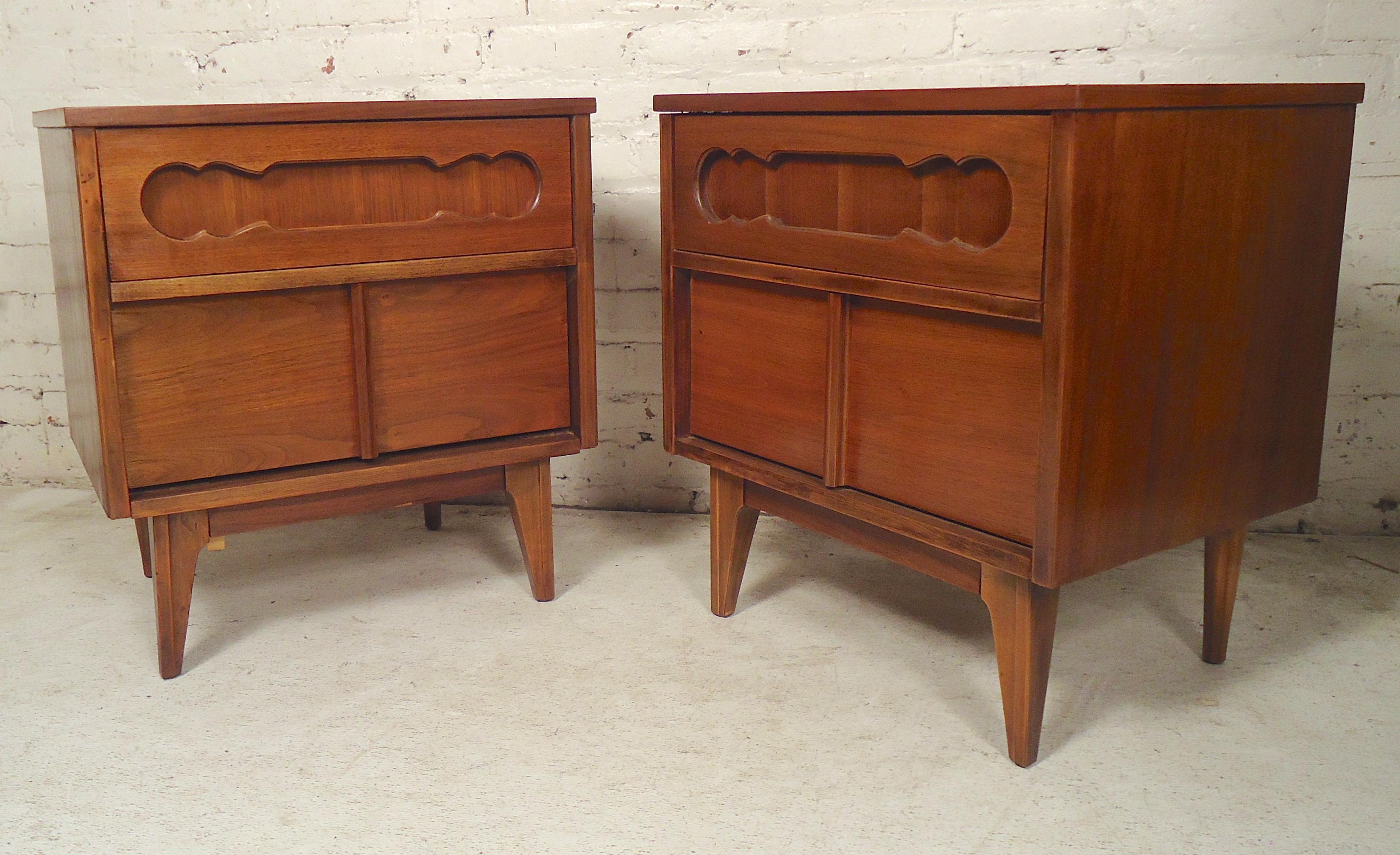 Pair of vintage nightstands with two drawers and decorative sculpted fronts.
(Please confirm item location - NY or NJ - with dealer).
 