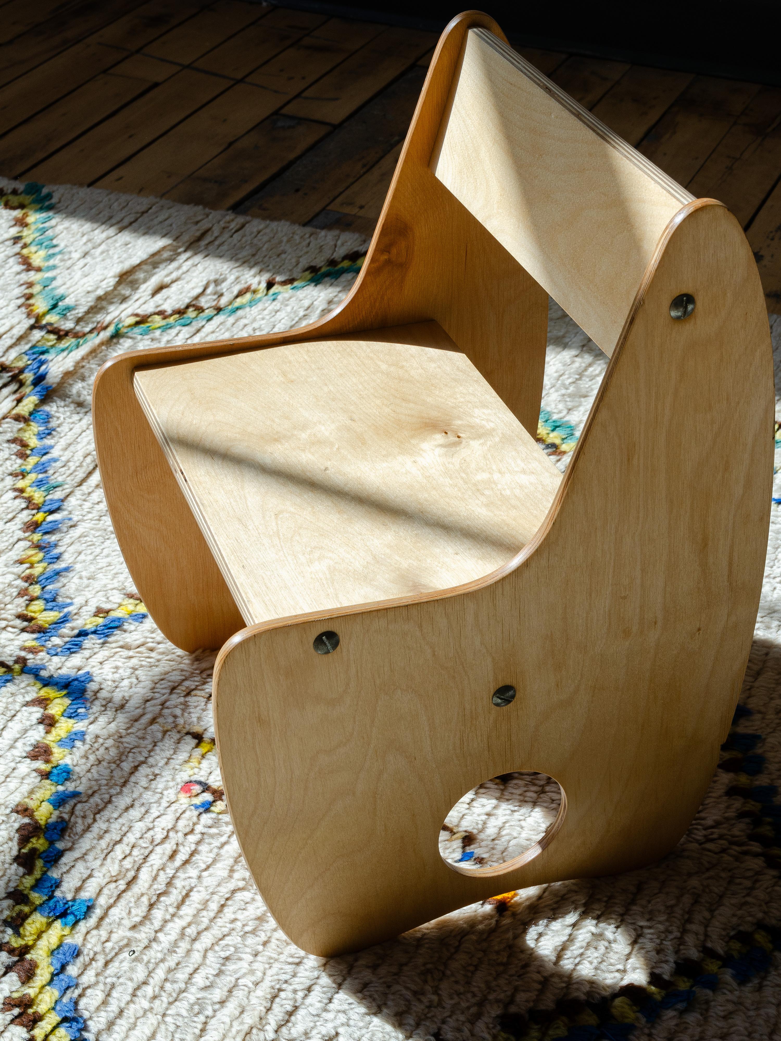 This children's mid-century chair, was designed post-war German architects Albrecht Lange and Hans Mitzlaff. The 