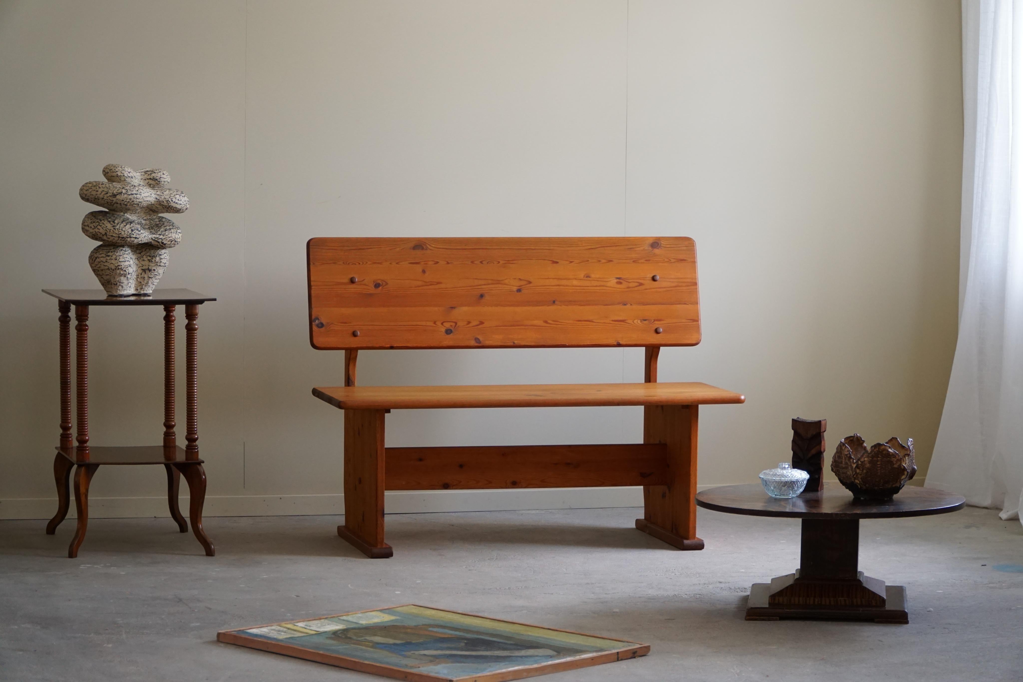 A charming bench in solid pine, crafted by a Swedish cabinetmaker in the 1970s.

Great craftmanship, perfectly suited for any interior style. A Modern, Scandinavian, Classic or an Art deco home decor.

A beautiful example and a great brutalist