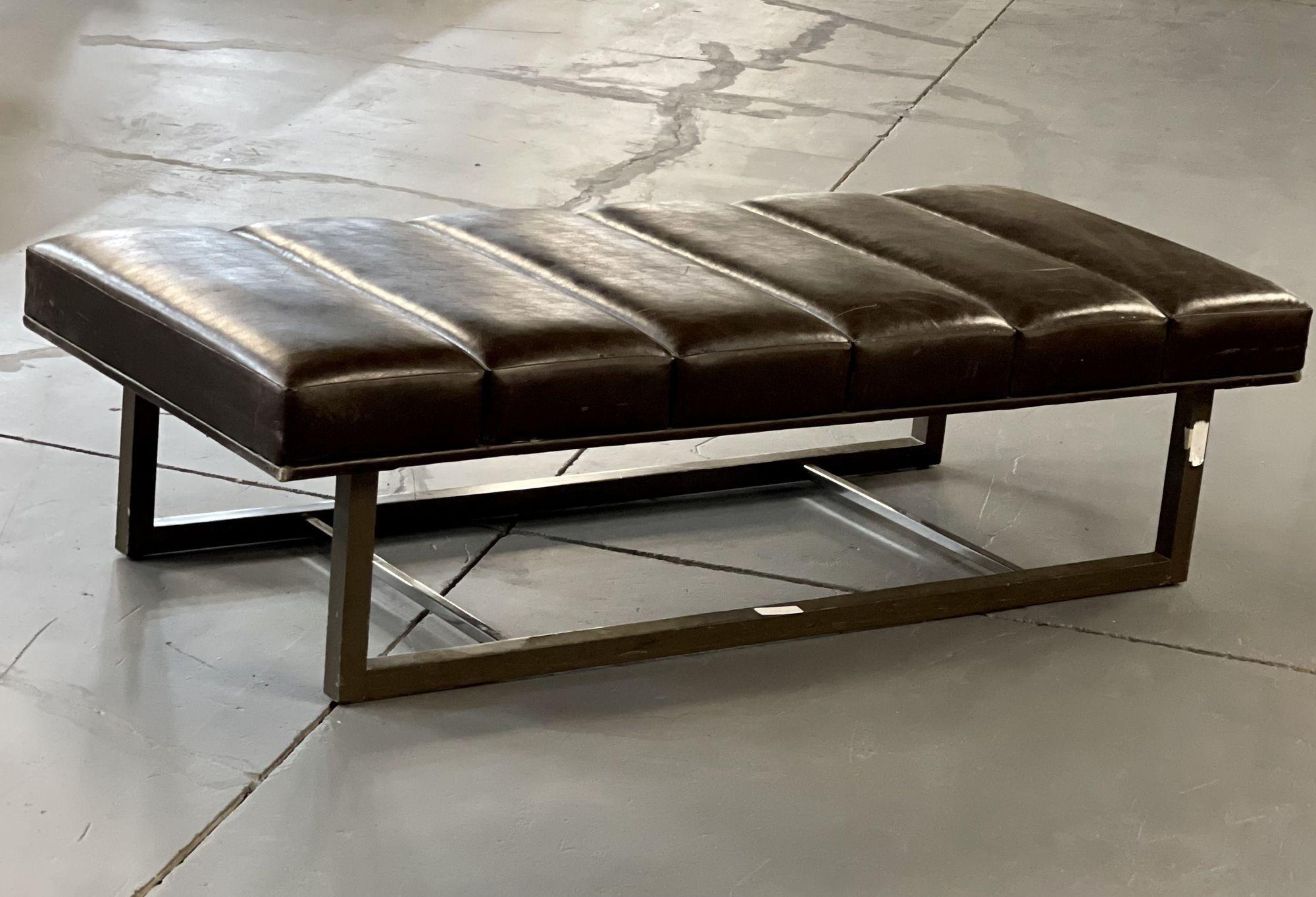 American designer mid-century leather bench. 
 
A sectioned leather bench on a steel base by J. A. Casillas. A sleek and stylish bench in the Mid Century Modern Taste on a rectangular base.