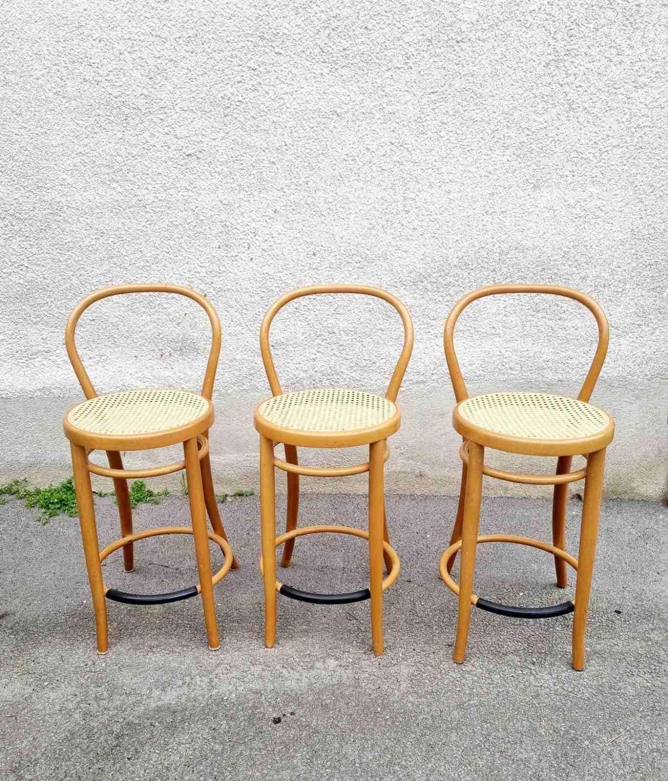 This three beautiful vintage Thonet style, Wooden Stools were made in Italy in '80s.
They are made of brown bentwood and beige wicker.

*Price is for one Stool.

Stool is very comfortable and perfect vintage addition for every room in your home or
