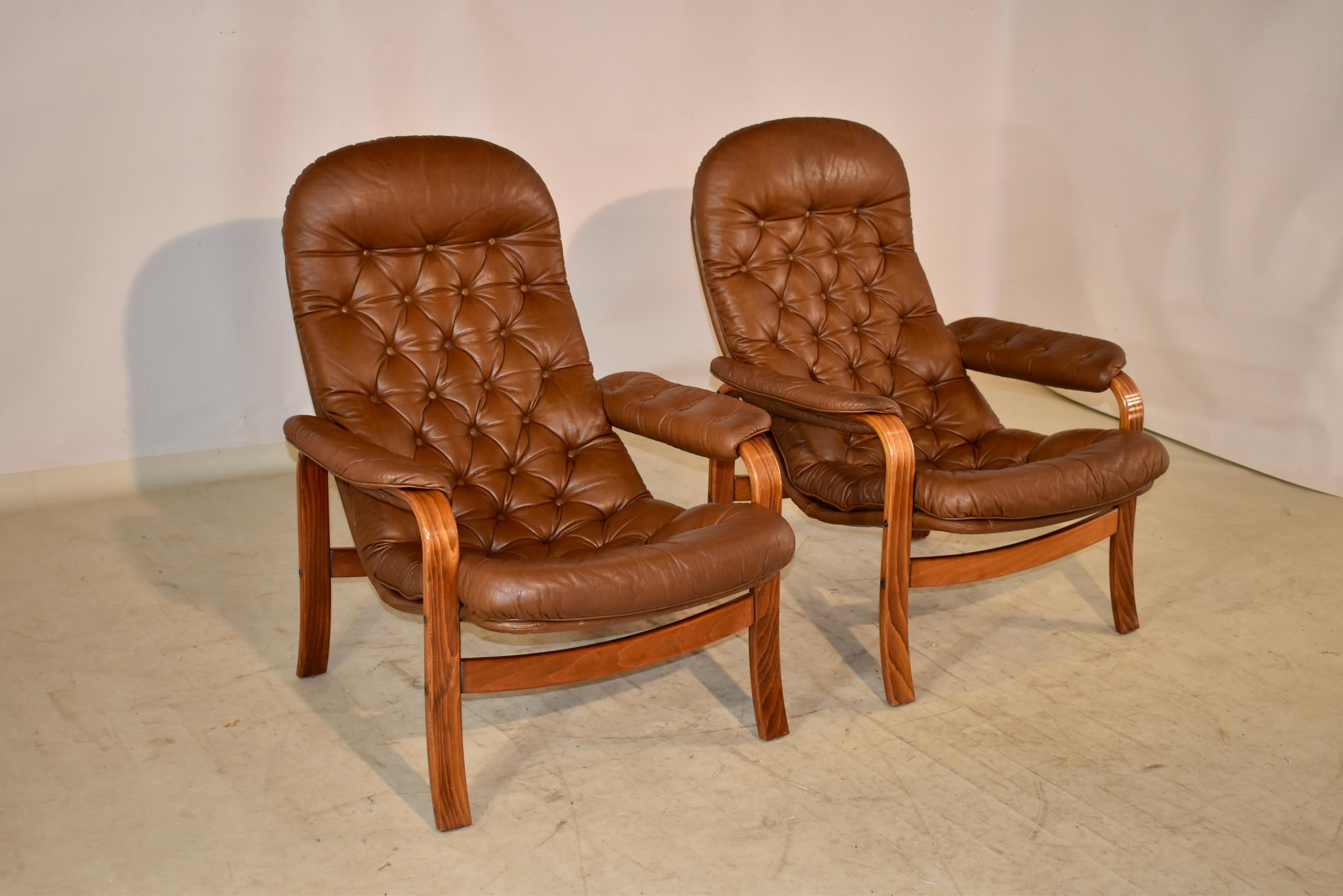 Pair of Scandinavian Modern Mid-Century Modern lounge chairs by Gote Mobler from Sweden. These chairs are completely original, and are in wonderful condition. The seats are so comfortable and are worn in such an elegant way as to look comfortable,